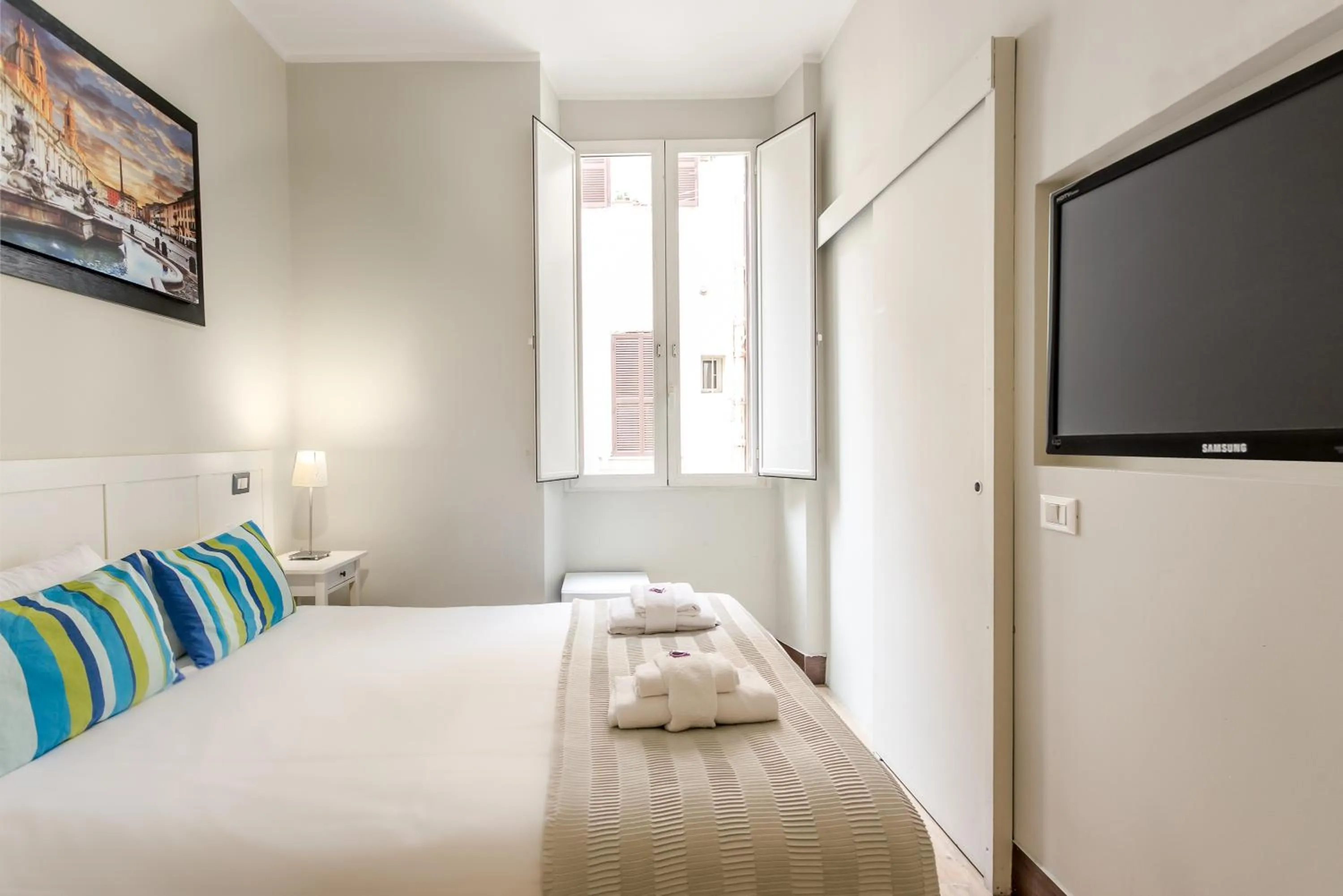 Bed in AmoRoma Suite