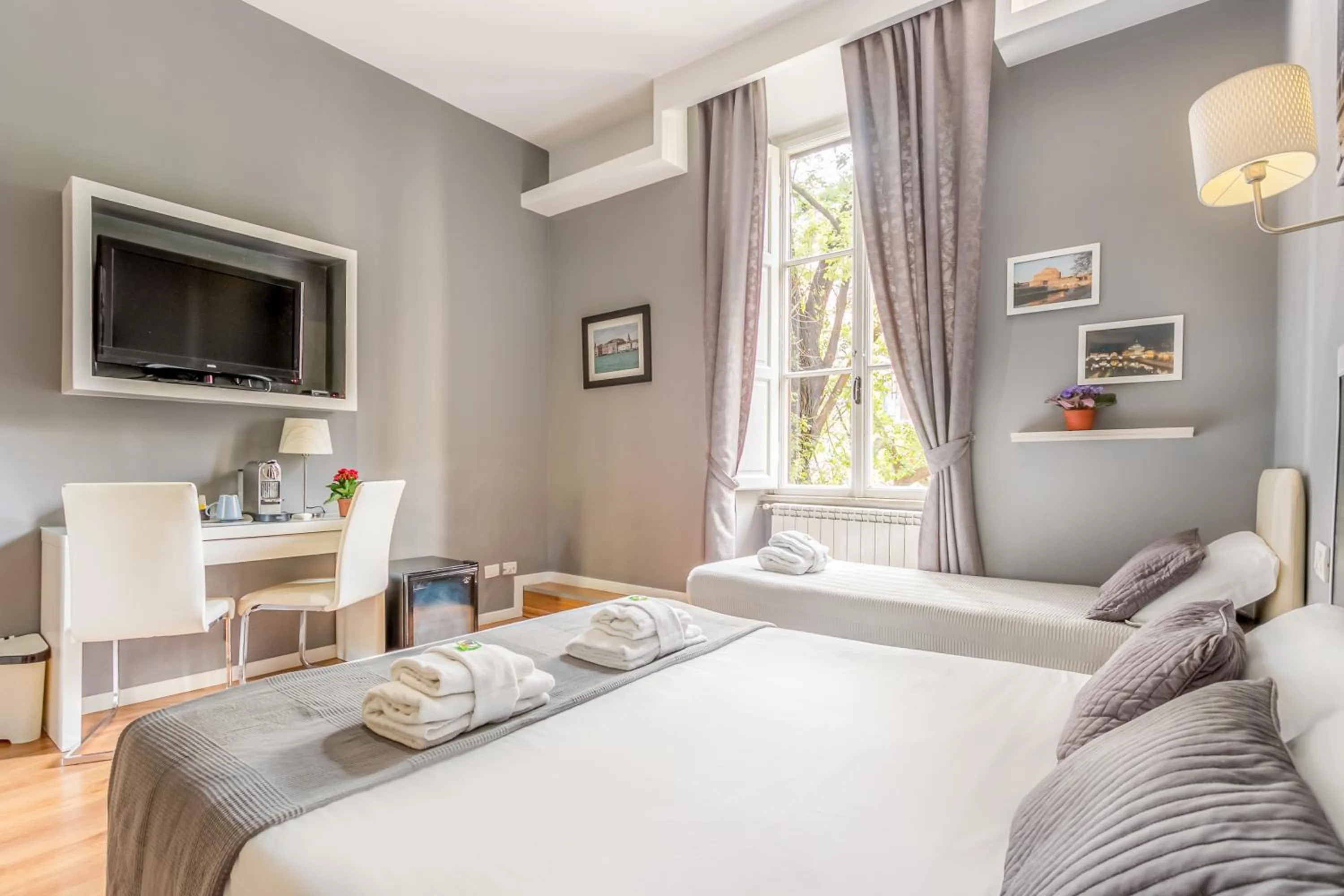 Bed in AmoRoma Suite