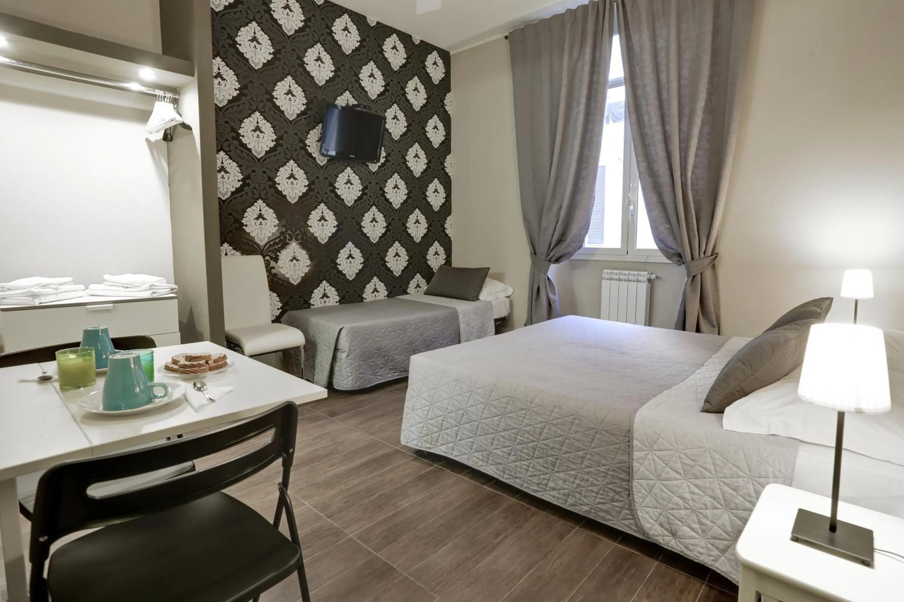 Bed in AmoRoma Suite