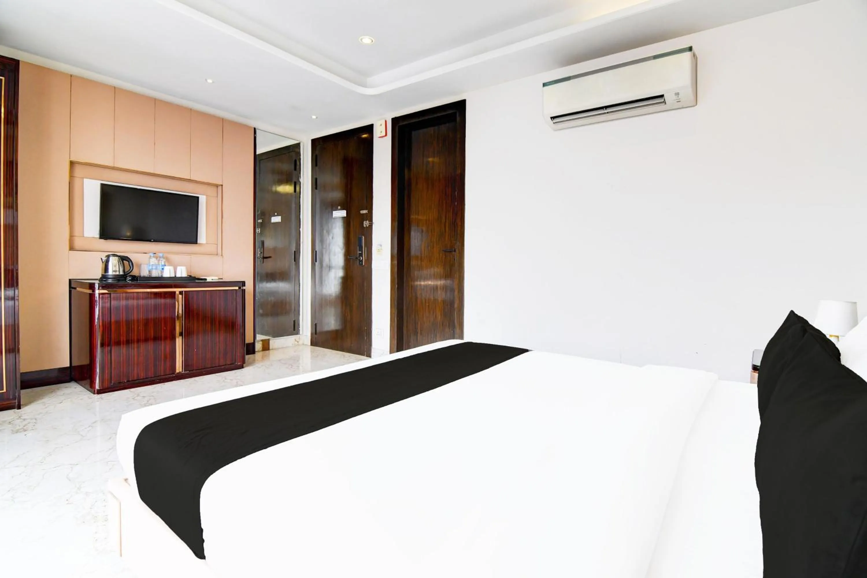 Bedroom, Bed in Super Townhouse New Town Formerly Krish Residency