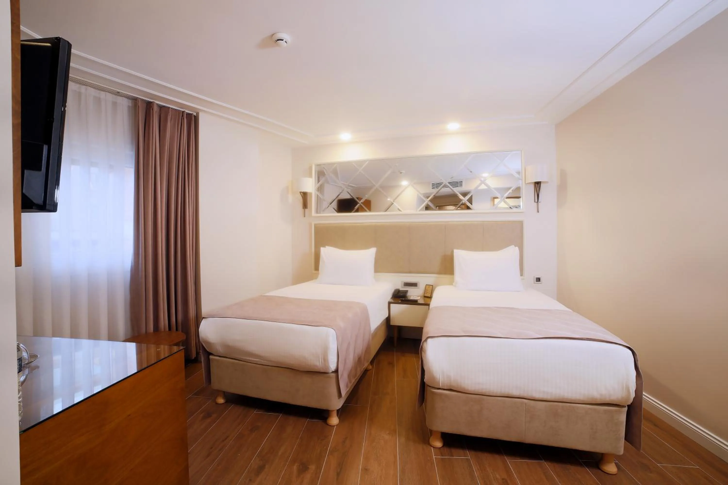 Bed in SORRISO HOTEL DUE