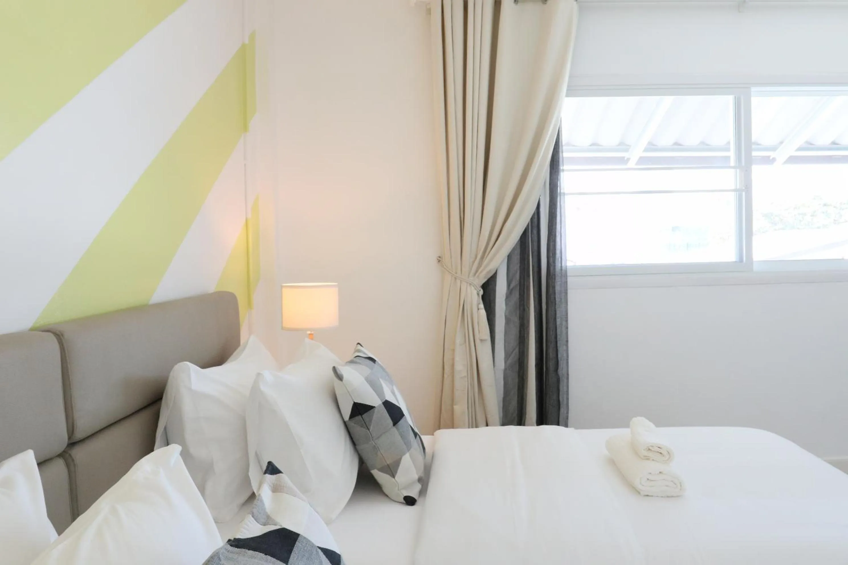 Bed in Airee Premier Residence