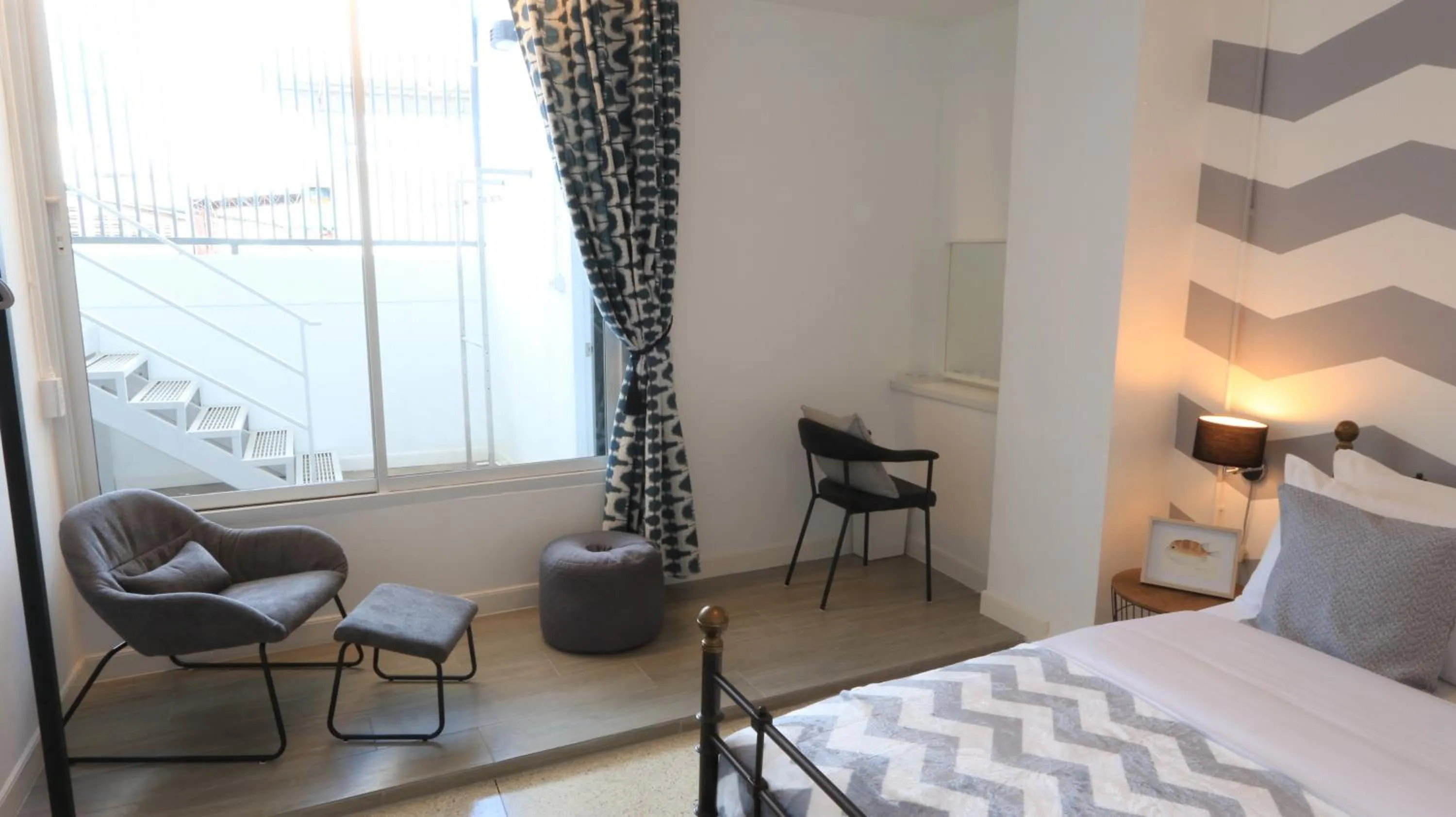 Seating area, Bed in Airee Premier Residence