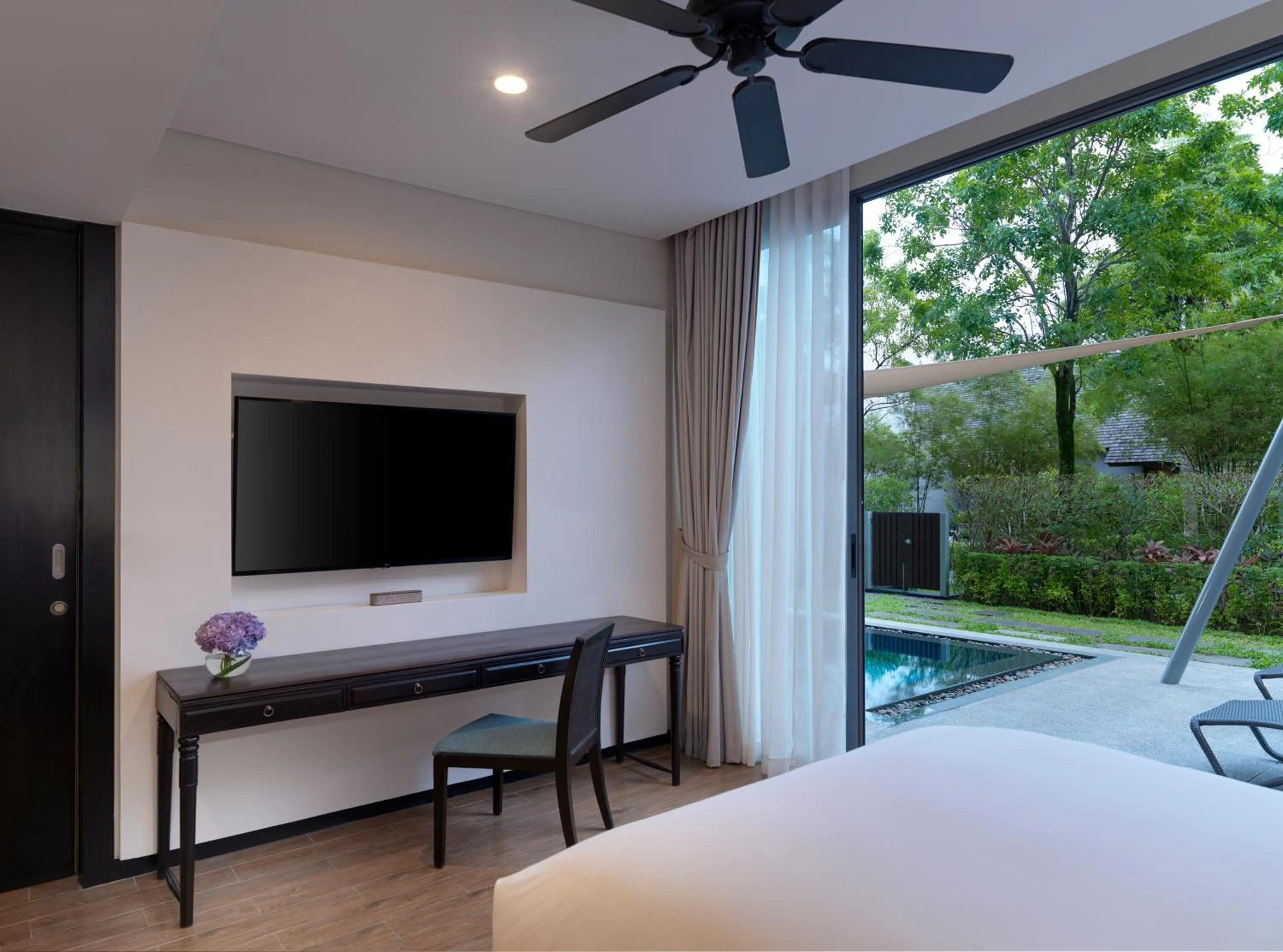 Communal lounge/ TV room in Avani Plus Mai Khao Phuket Suites