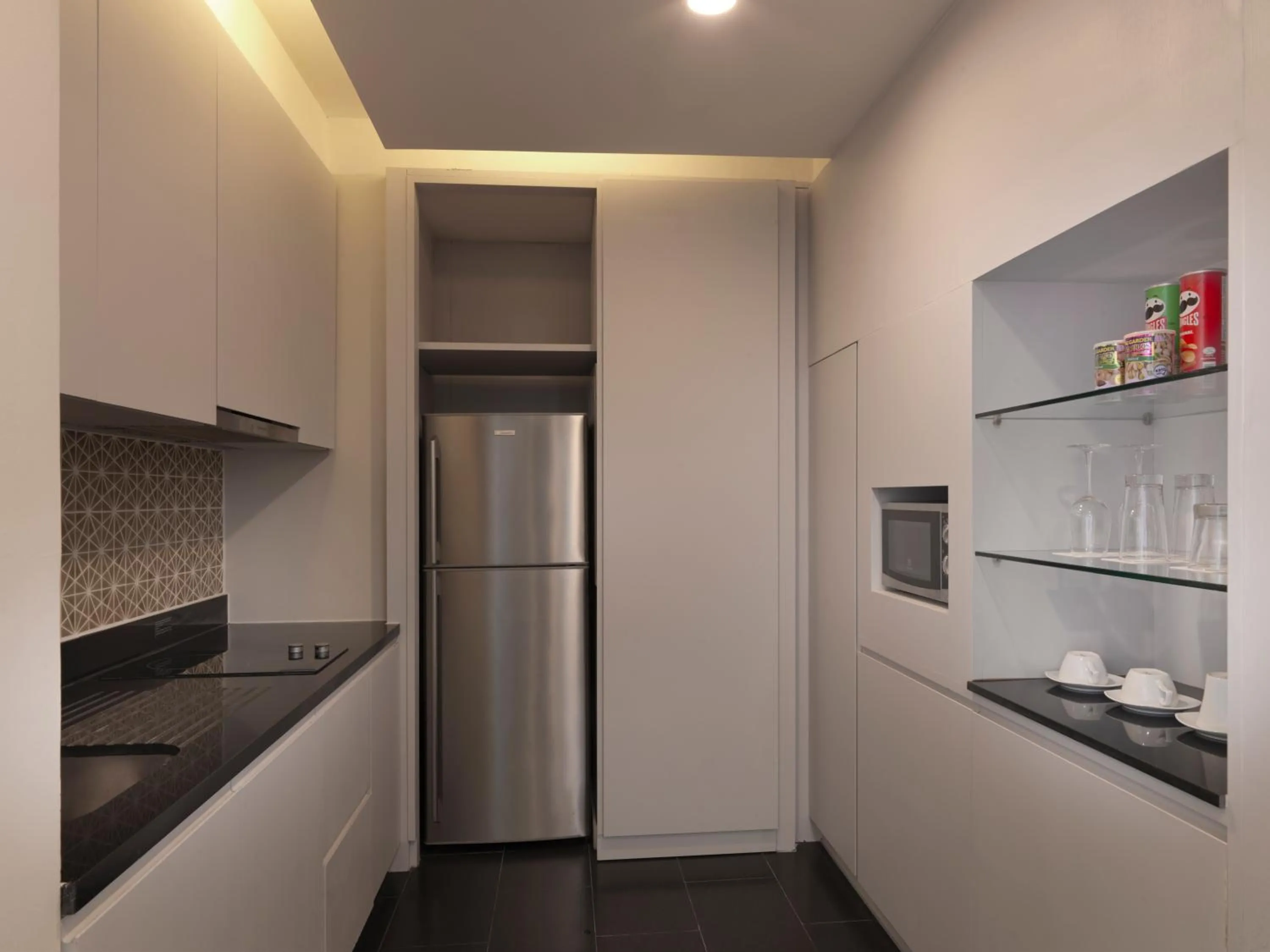 Kitchen or kitchenette in Avani Plus Mai Khao Phuket Suites