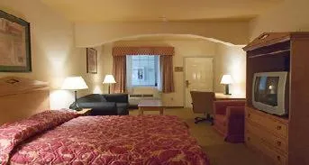 Photo of the whole room, Bed in Garden Inn Hotel
