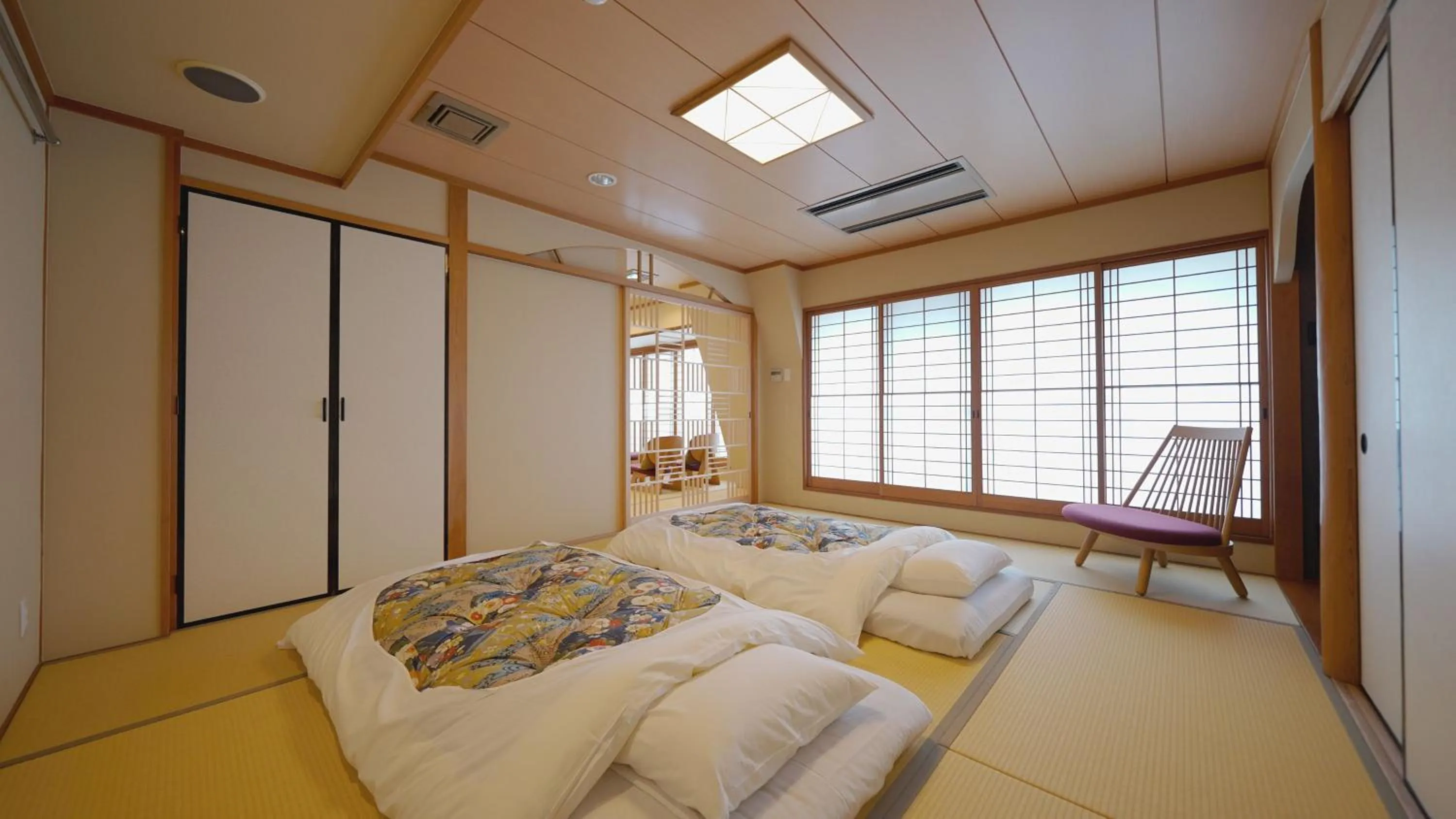 Photo of the whole room, Bed in Nishiyama Ryokan - Established in 1953