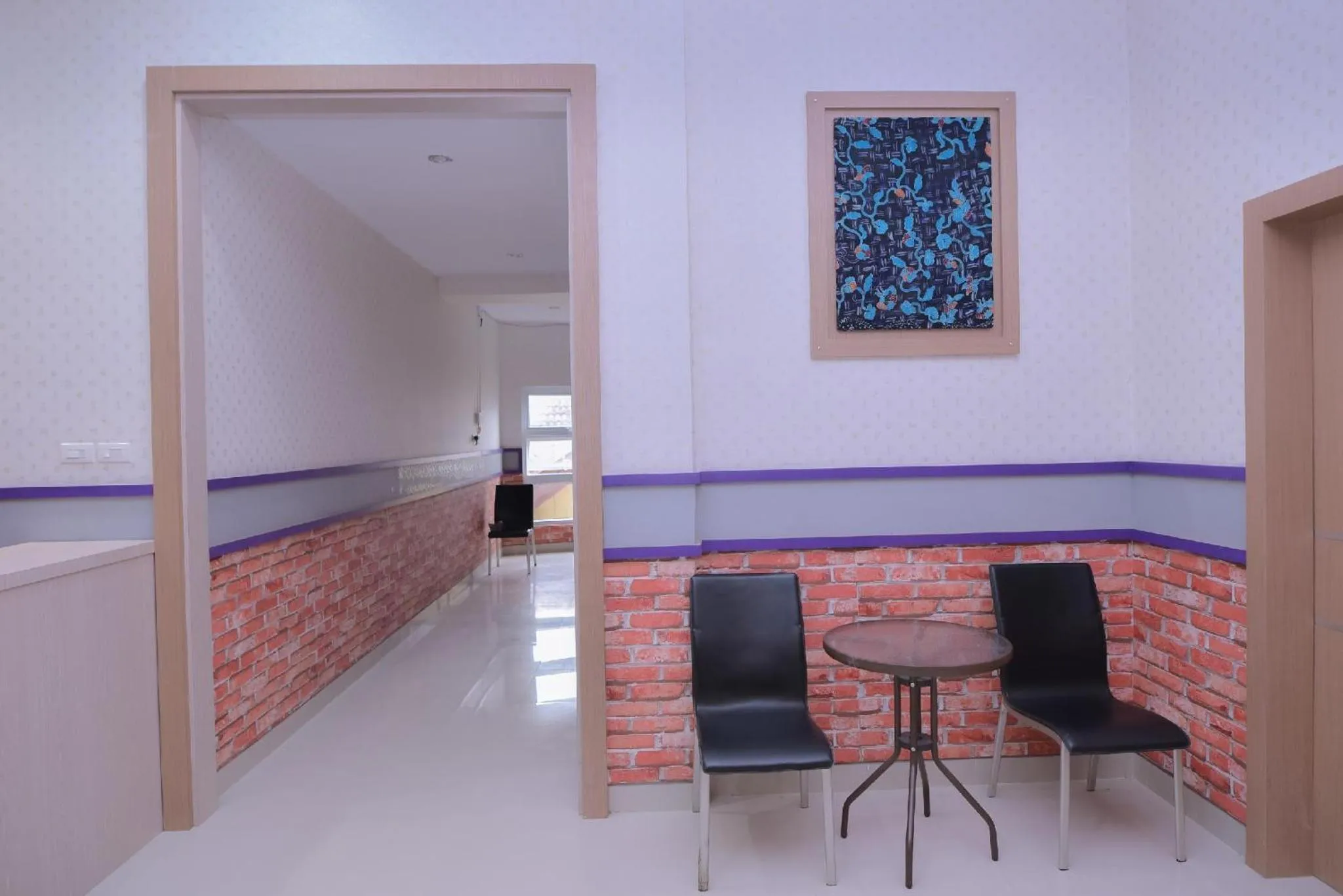 Lobby or reception in Capital O 2018 Ring Road Guest House Syariah