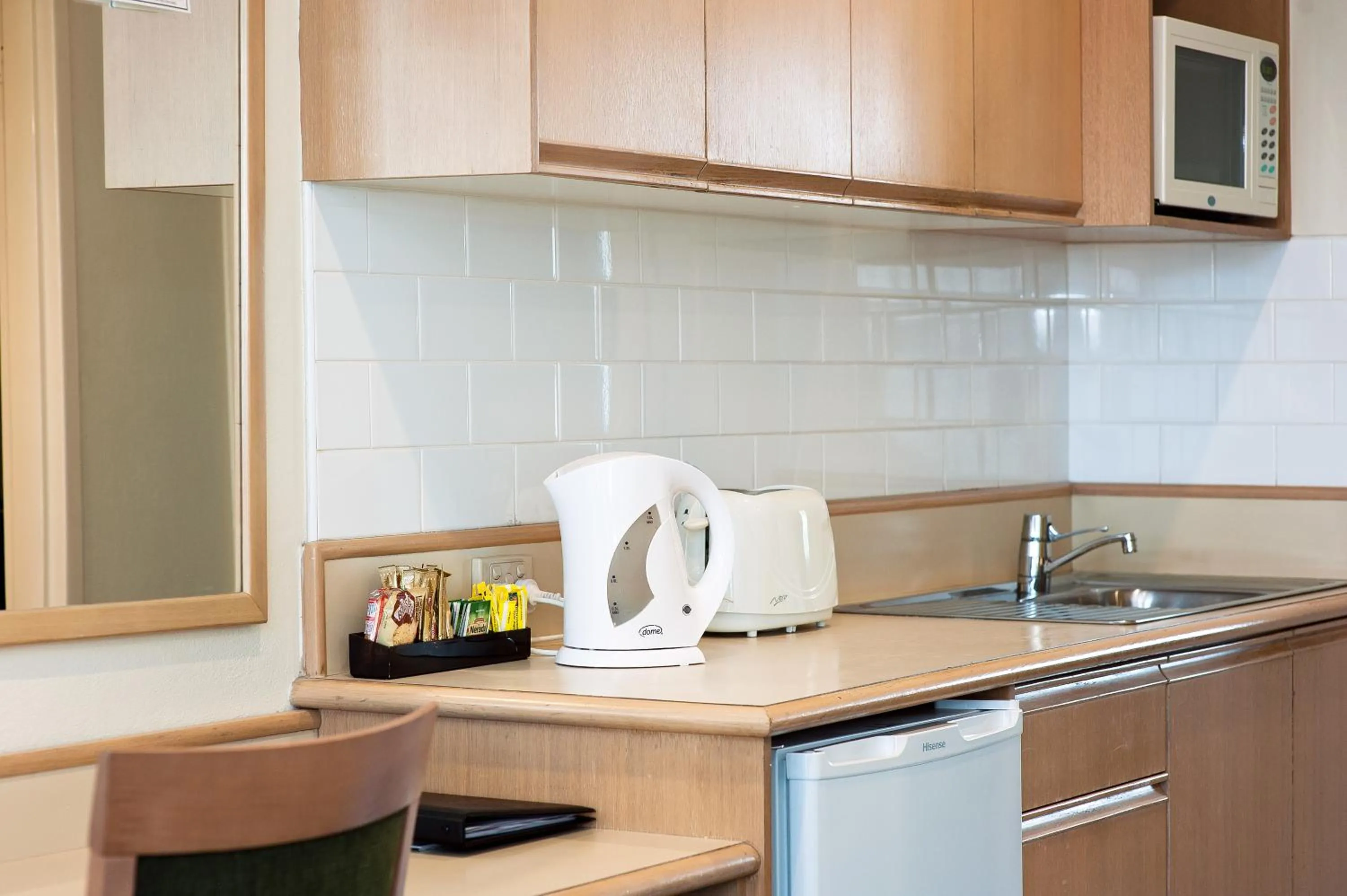 Kitchen or kitchenette in Colonial Terrace Motor Inn