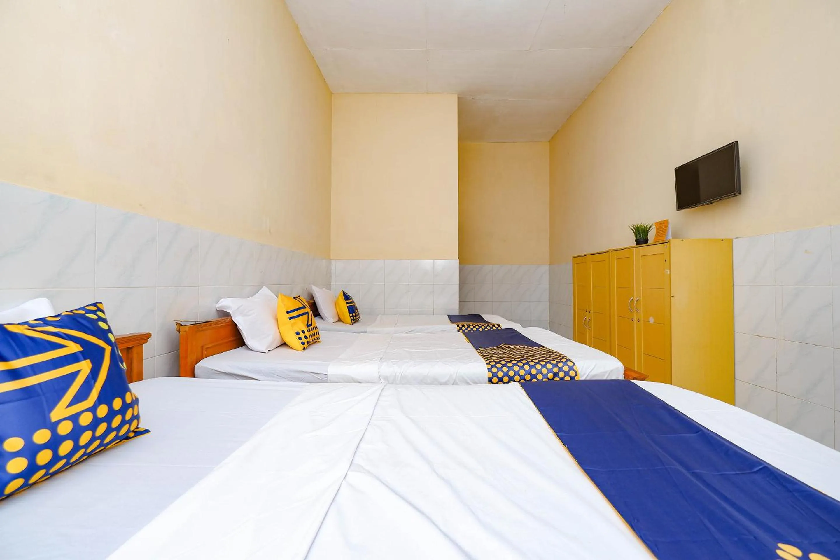 Bedroom in SPOT ON 2011 Hotel Mekar Sari