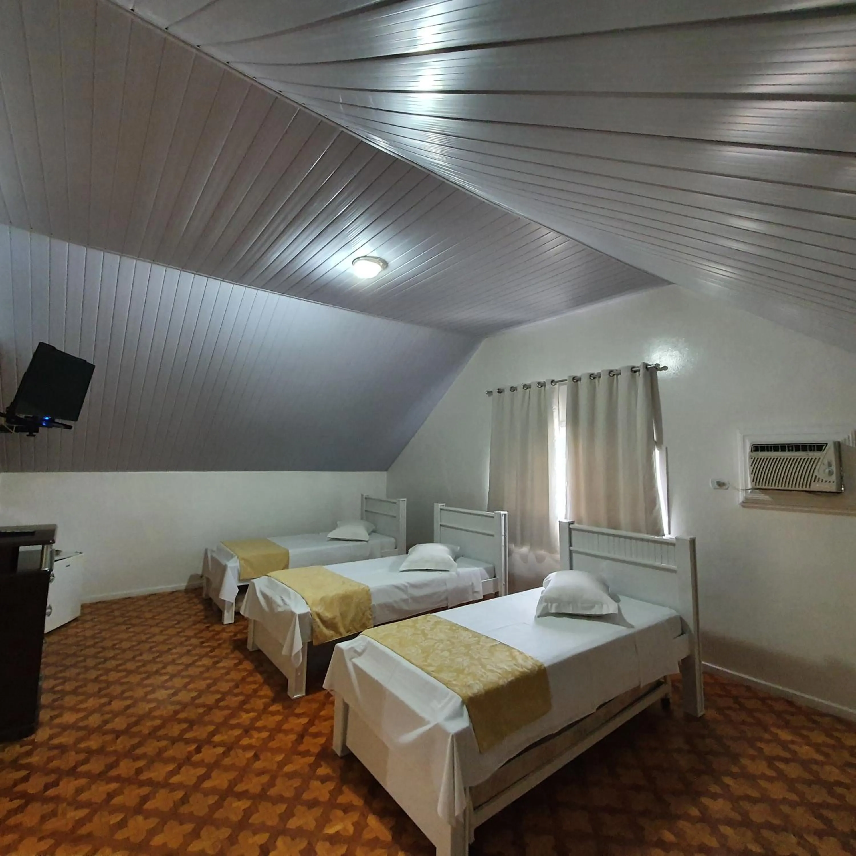 Bed in Grand Ville Hotel