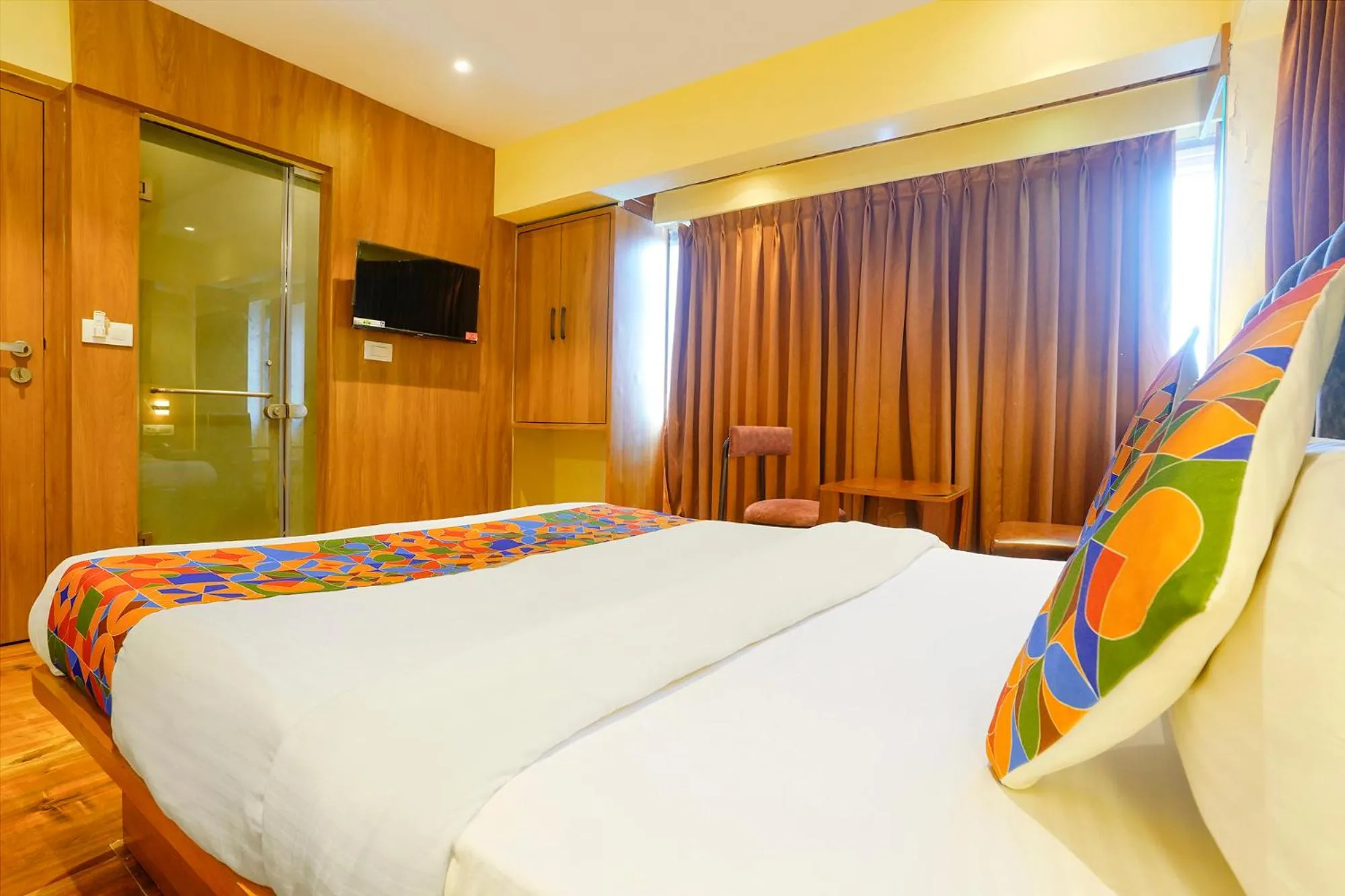 Bed in FabHotel Ratna Mahal