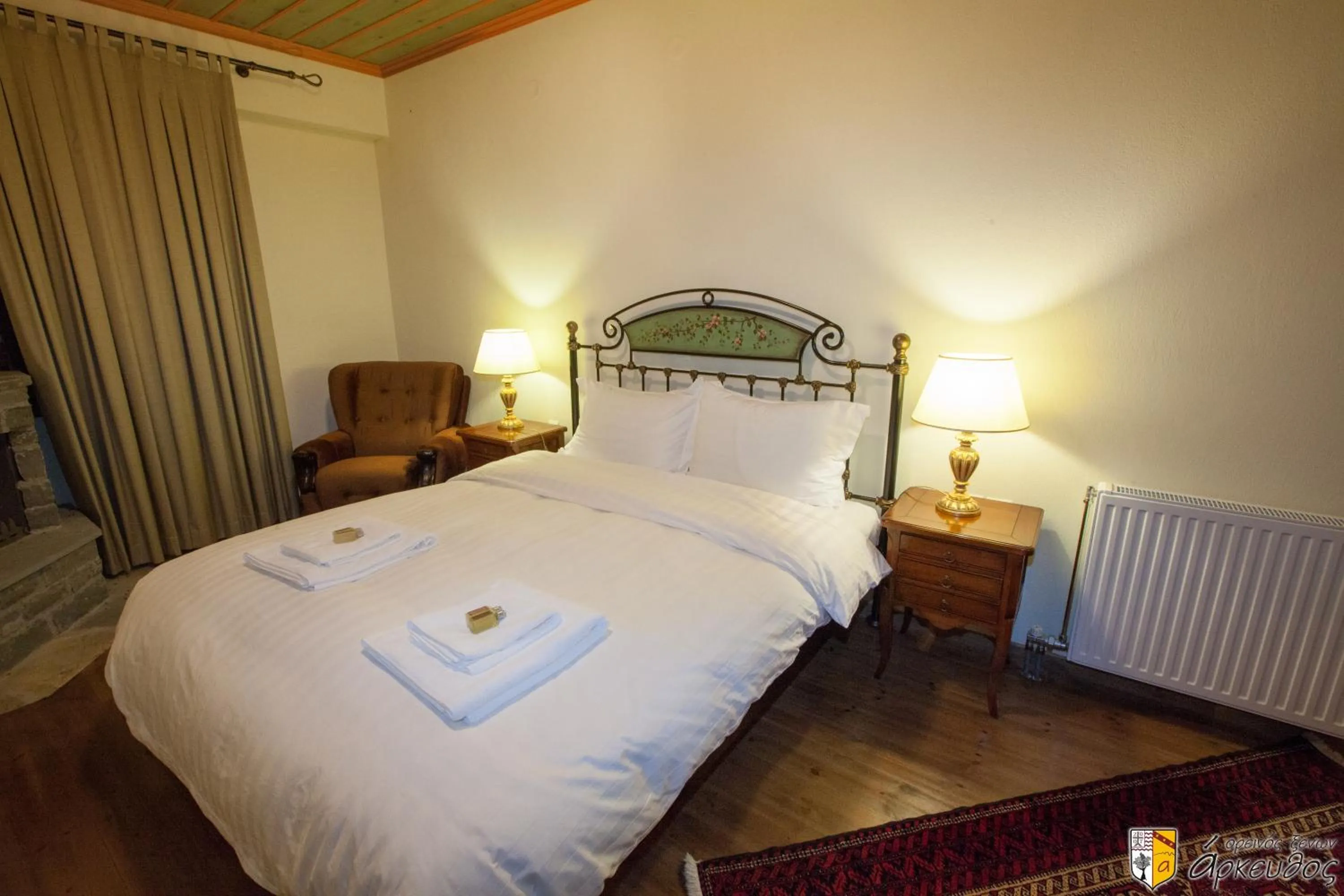 Bed in Arkefthos Mountain Hotel