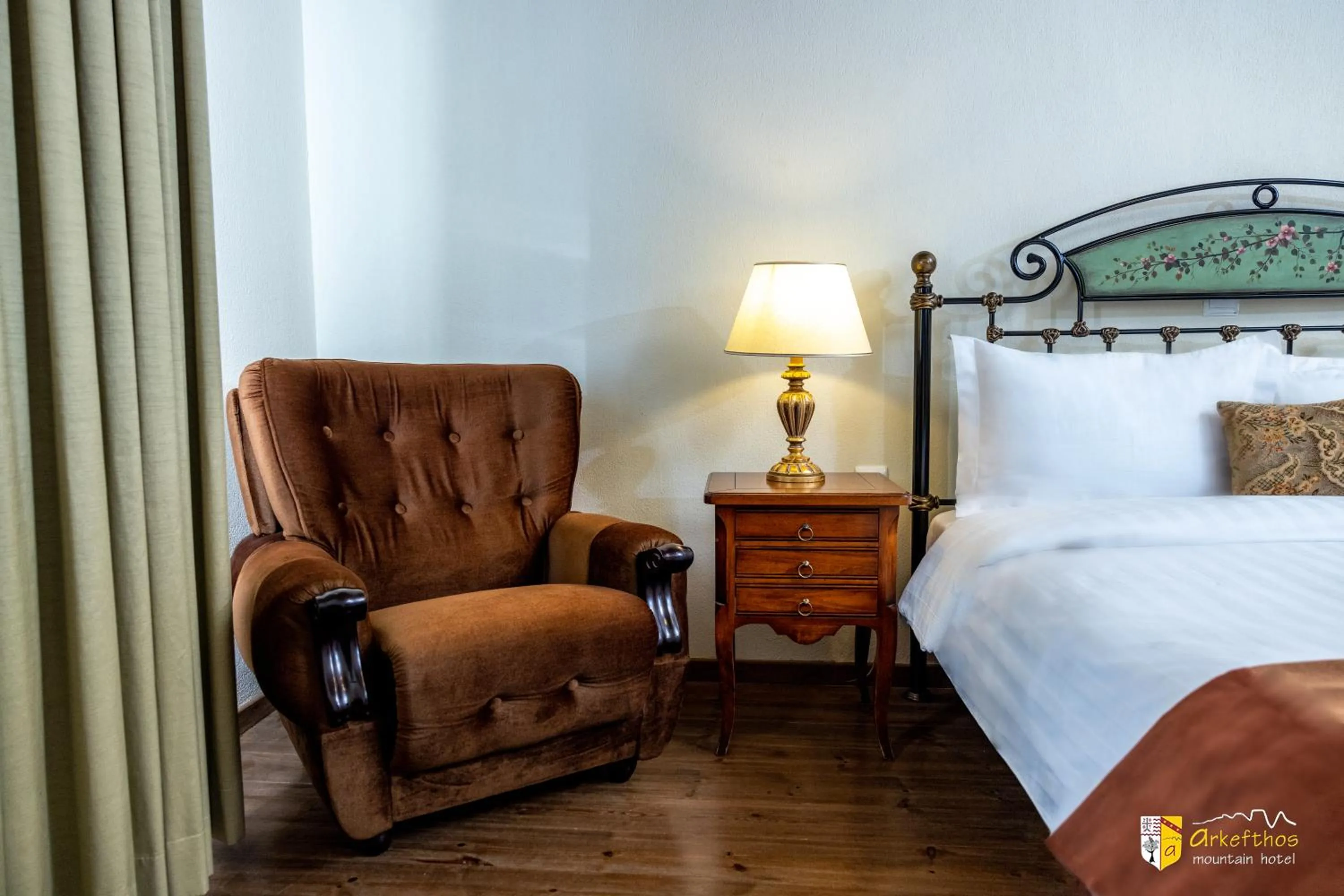 Bed in Arkefthos Mountain Hotel