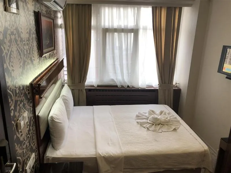 Bed in Elit Palace Hotel