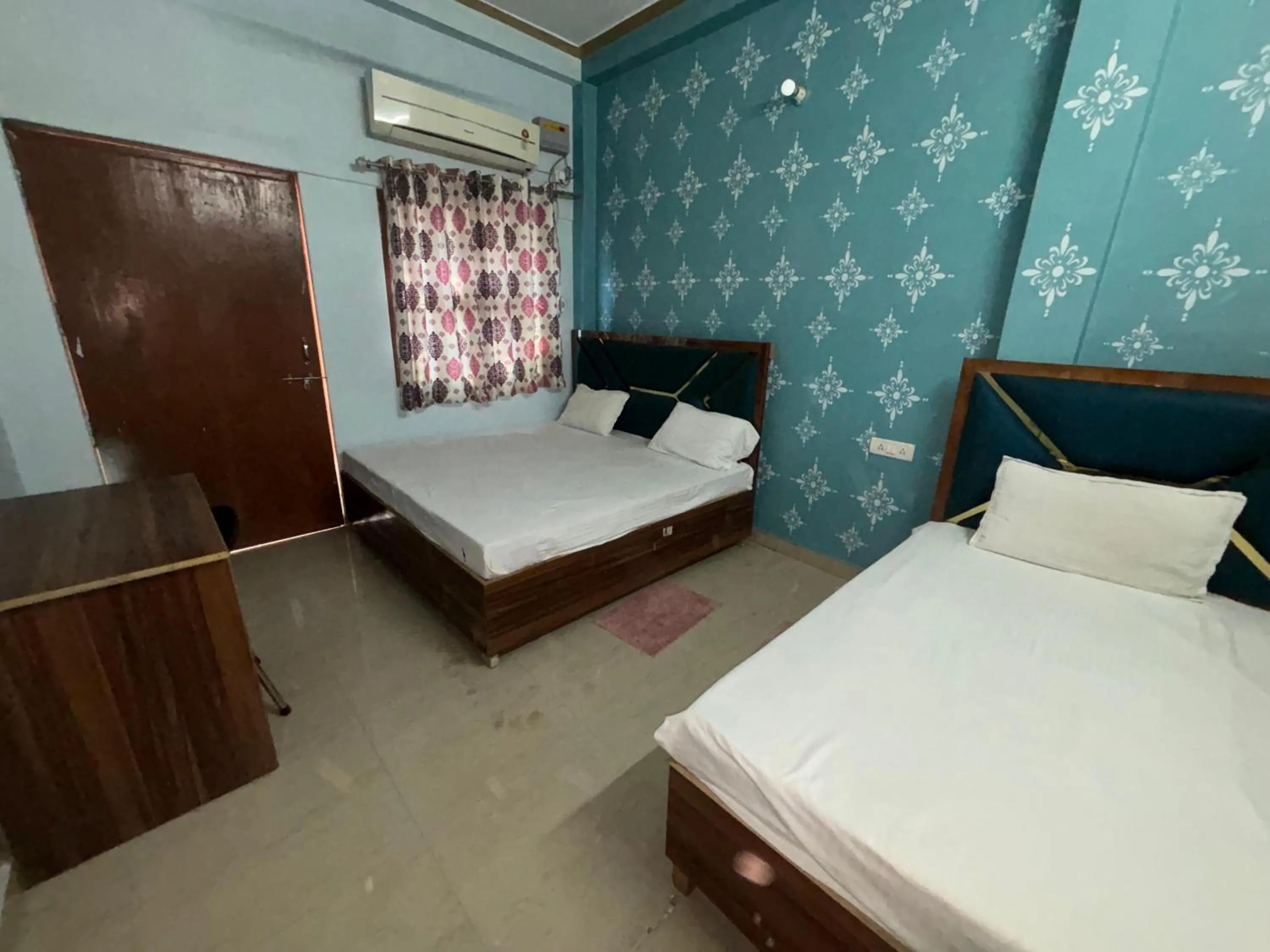 Bed in Mahamaya Guest House