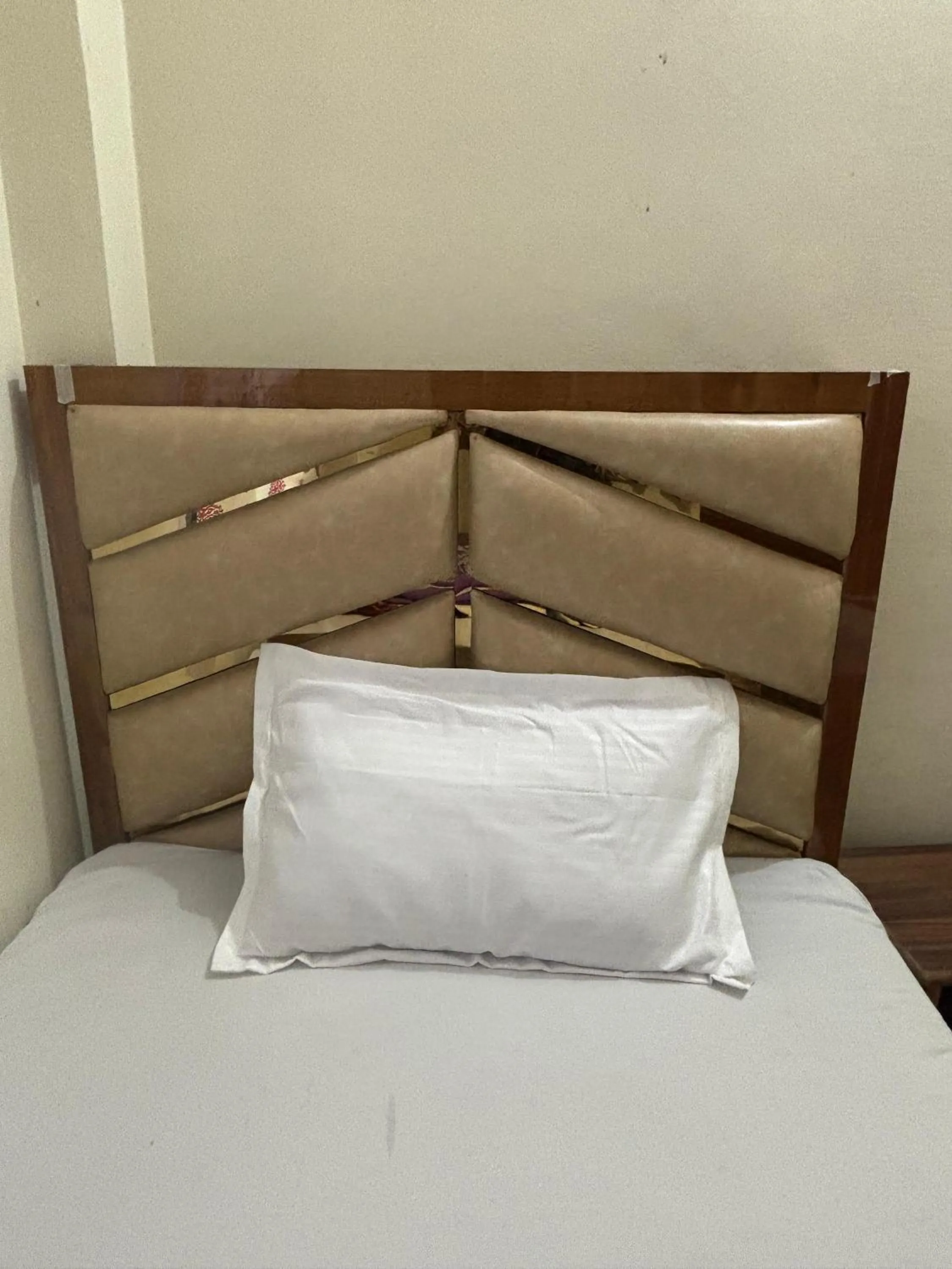 Bed in Mahamaya Guest House