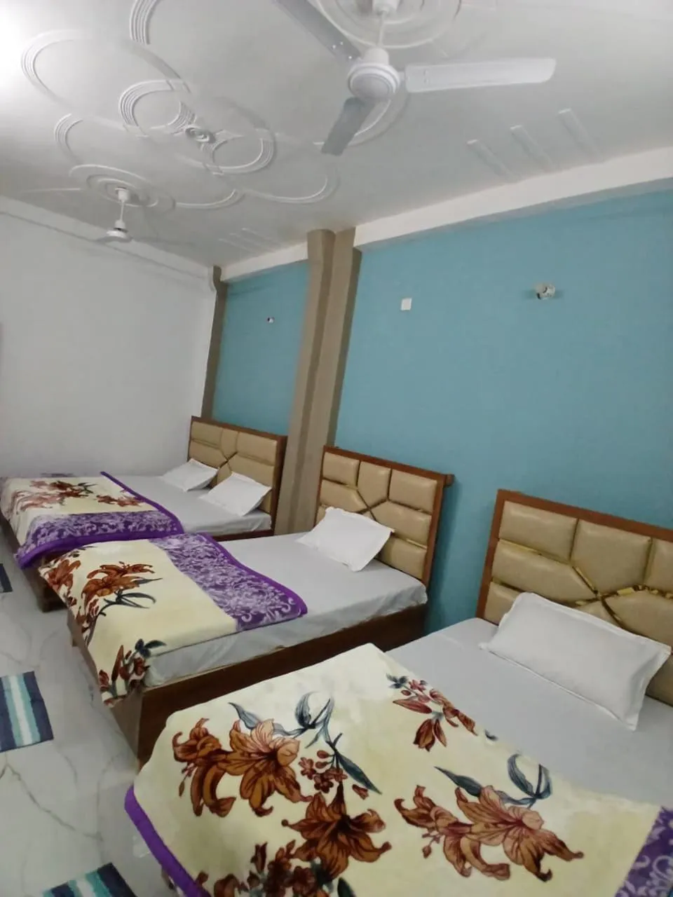 Bed in Mahamaya Guest House