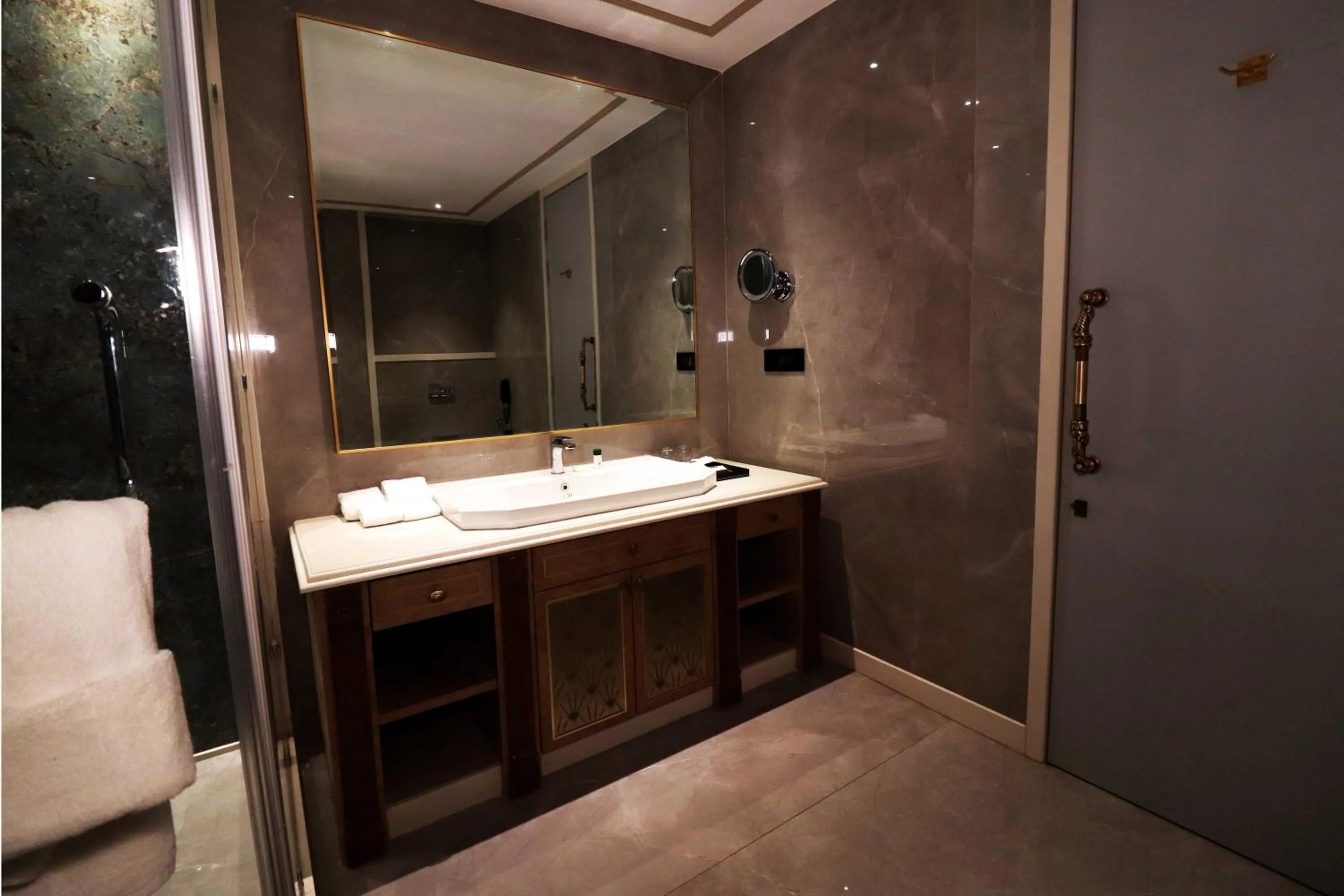 Bathroom in Seven Eleven Hotels and Club