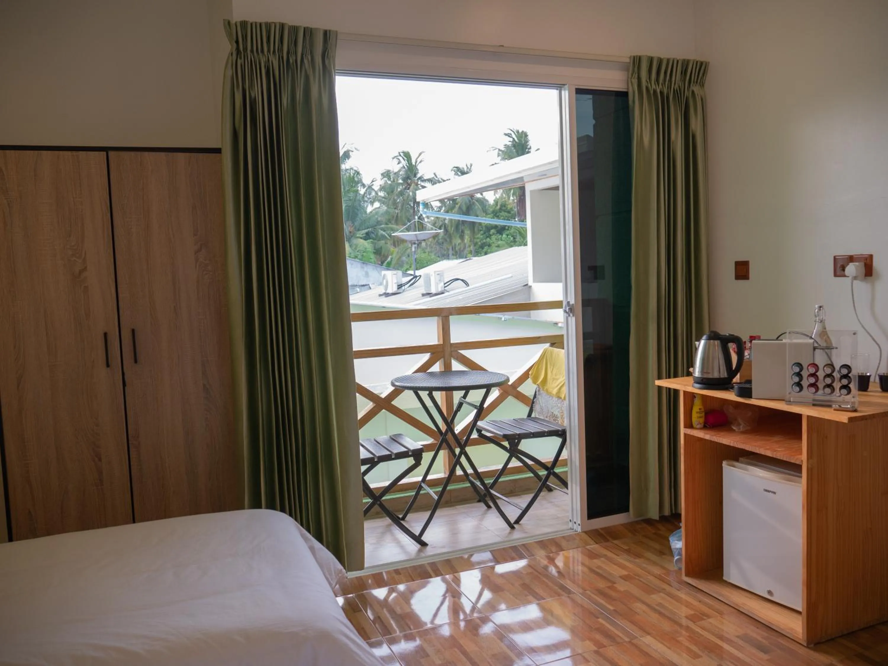 Seating area, Bed in Turtle Maldives - Your Gateway to the Beach & Marine Adventures Await!