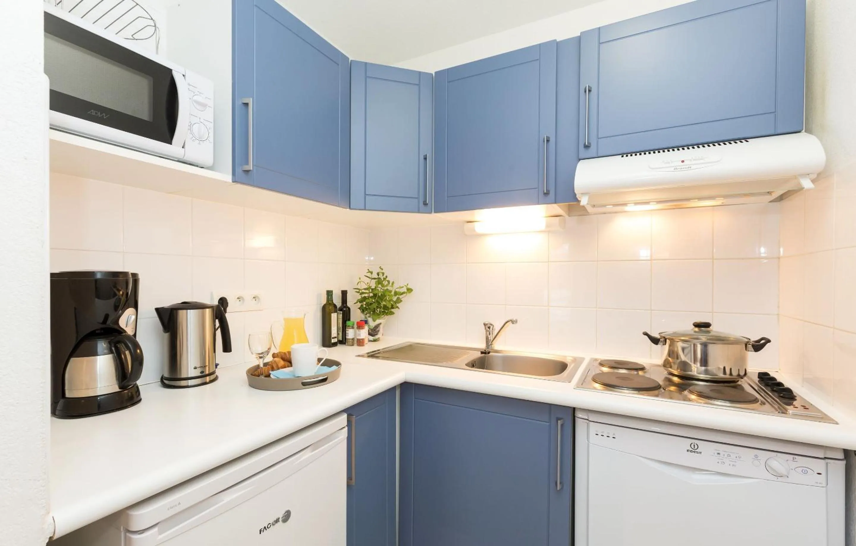 Kitchen or kitchenette in Résidence Odalys Les Sources de Manon