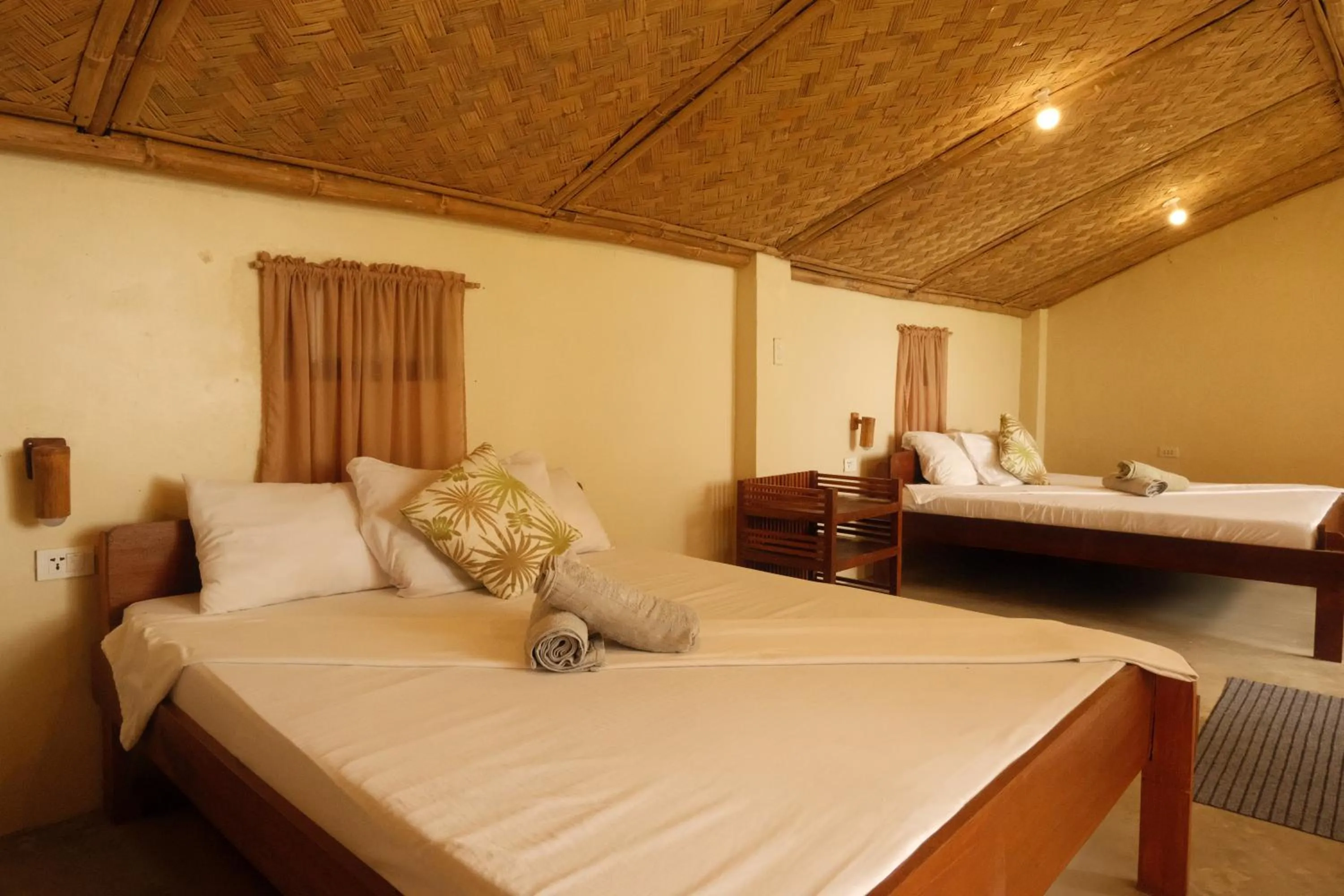 Bed in Cocovana Beach Resort