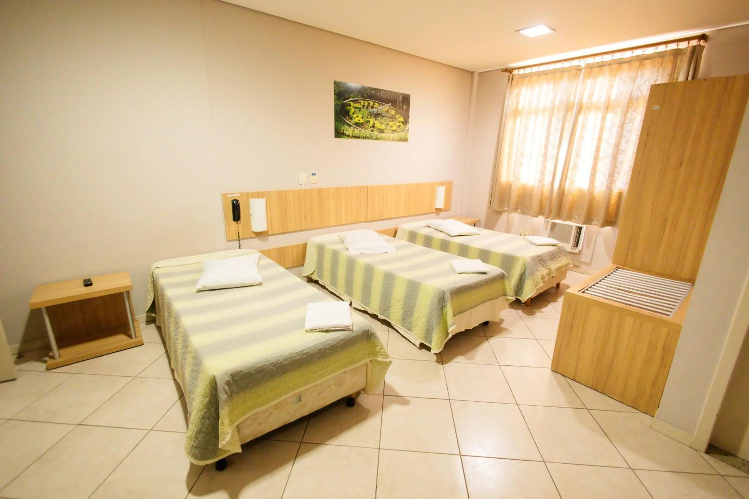 Bed in CHA Mime Hotel