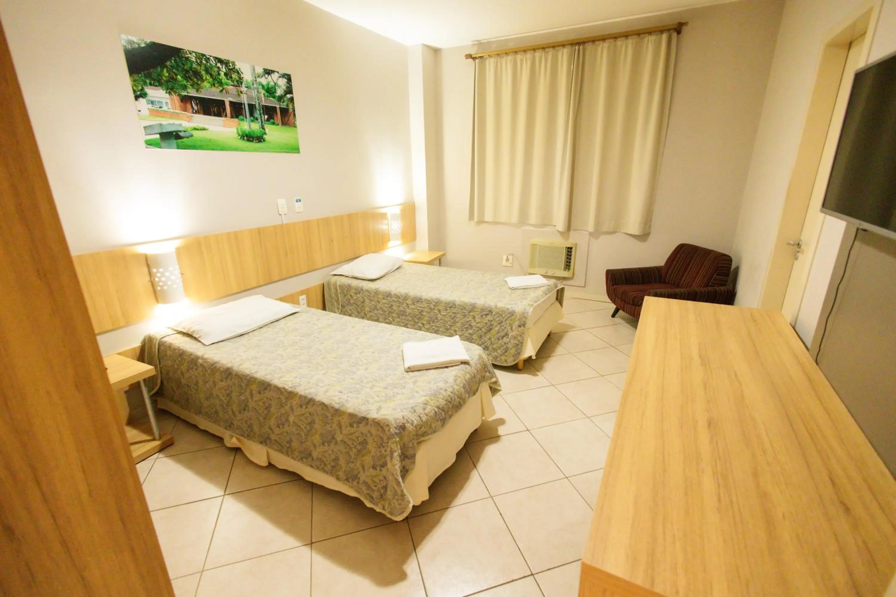 Bed in CHA Mime Hotel