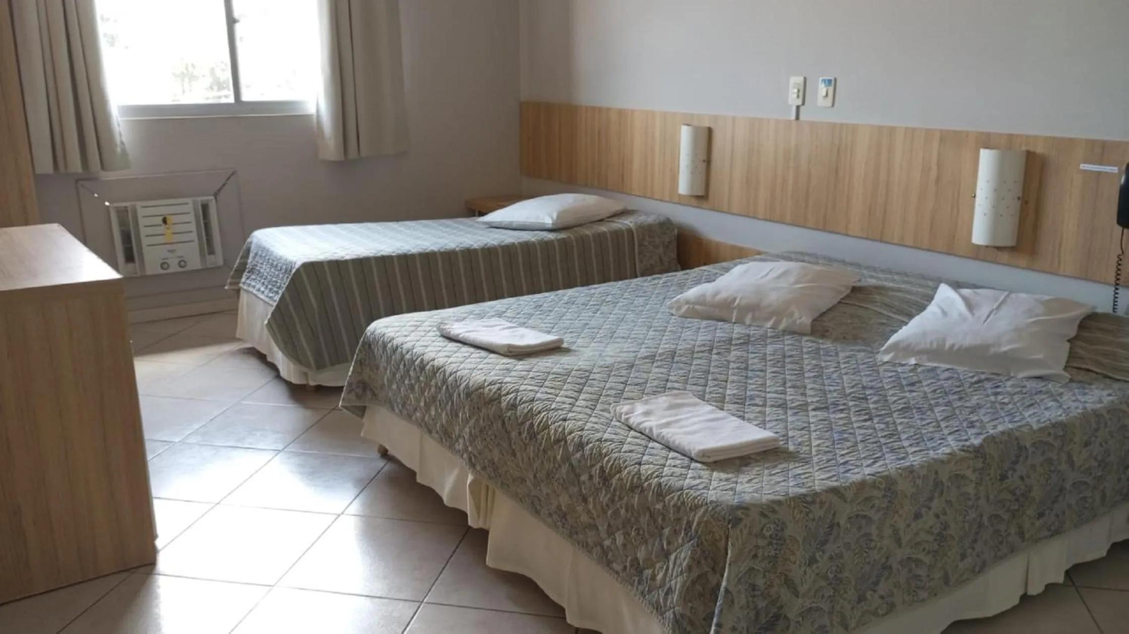 Bed in CHA Mime Hotel