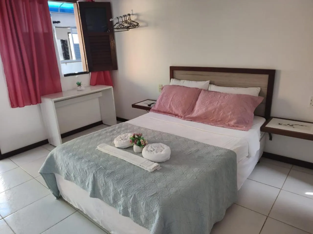 Bed in Pousada Camburi Star