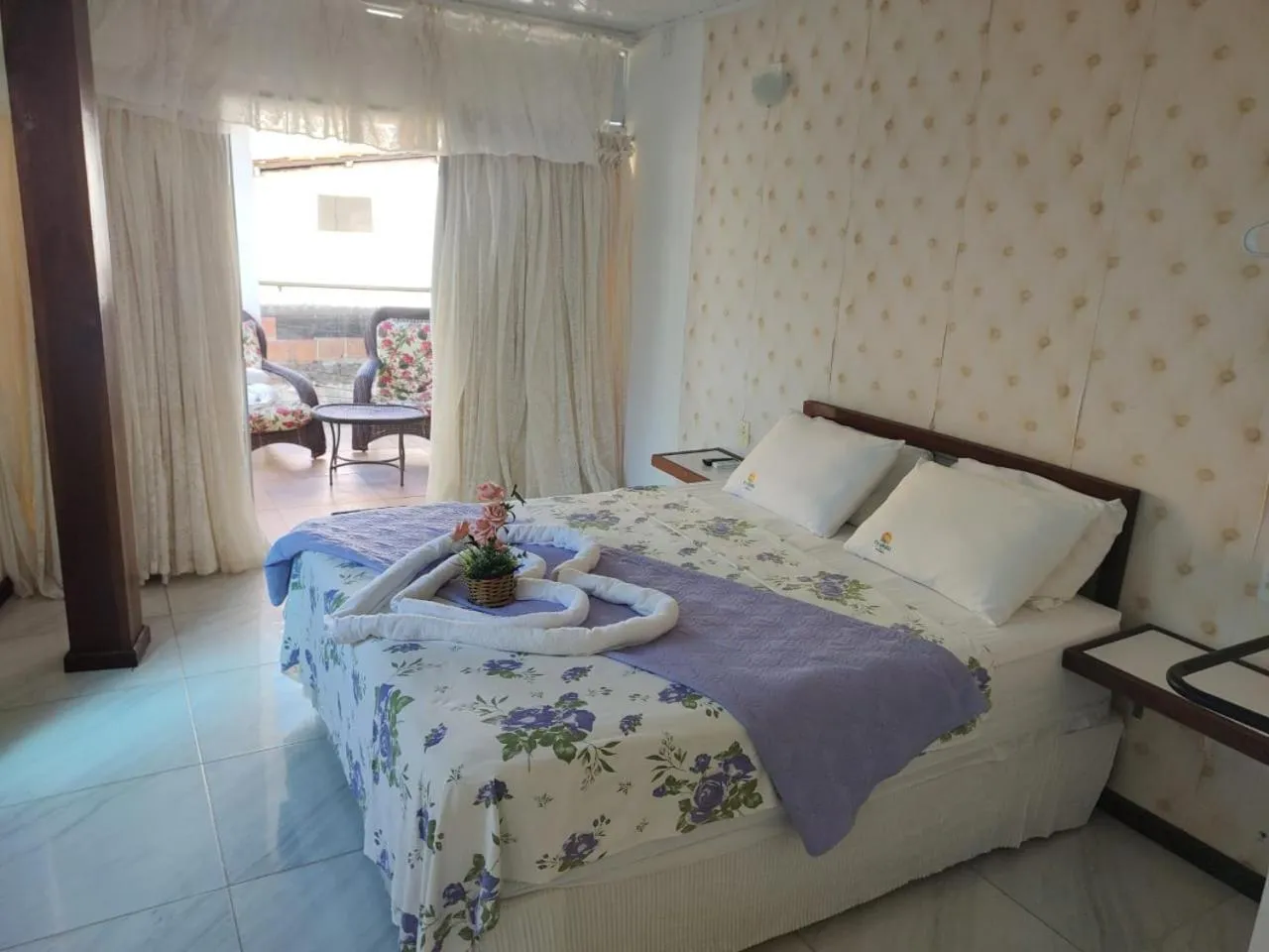 Bed in Pousada Camburi Star