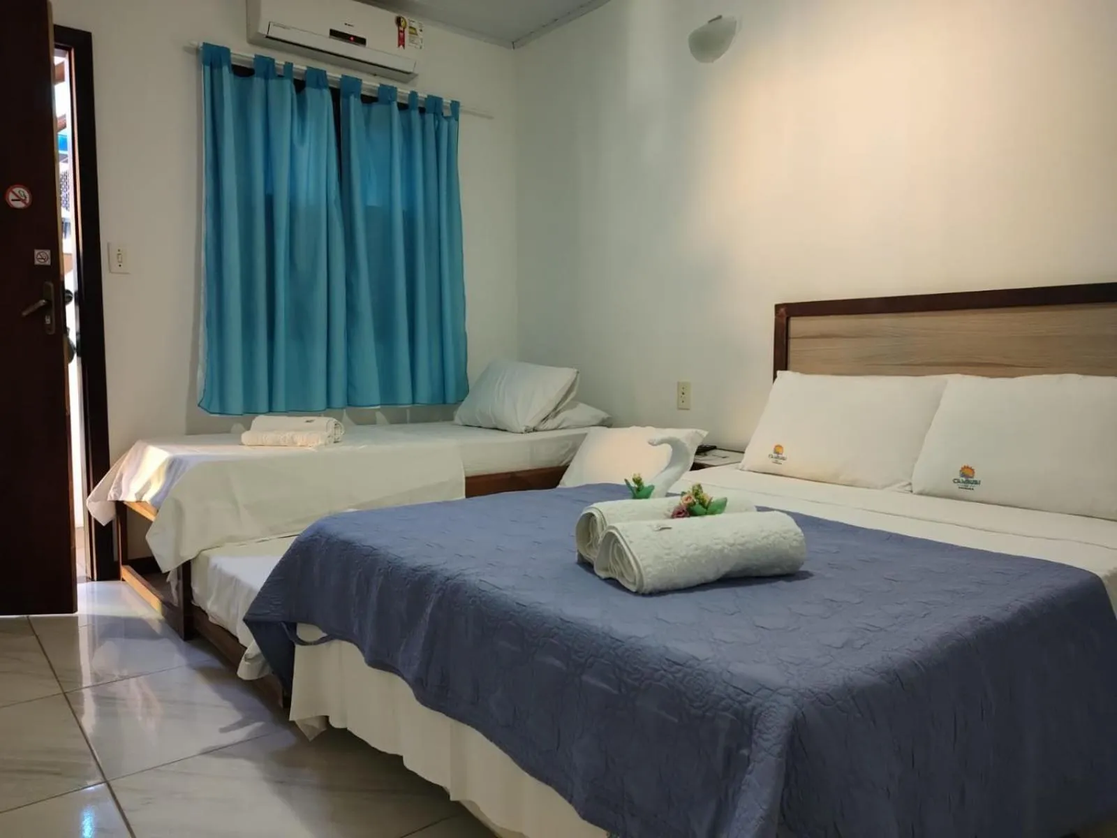 Bed in Pousada Camburi Star