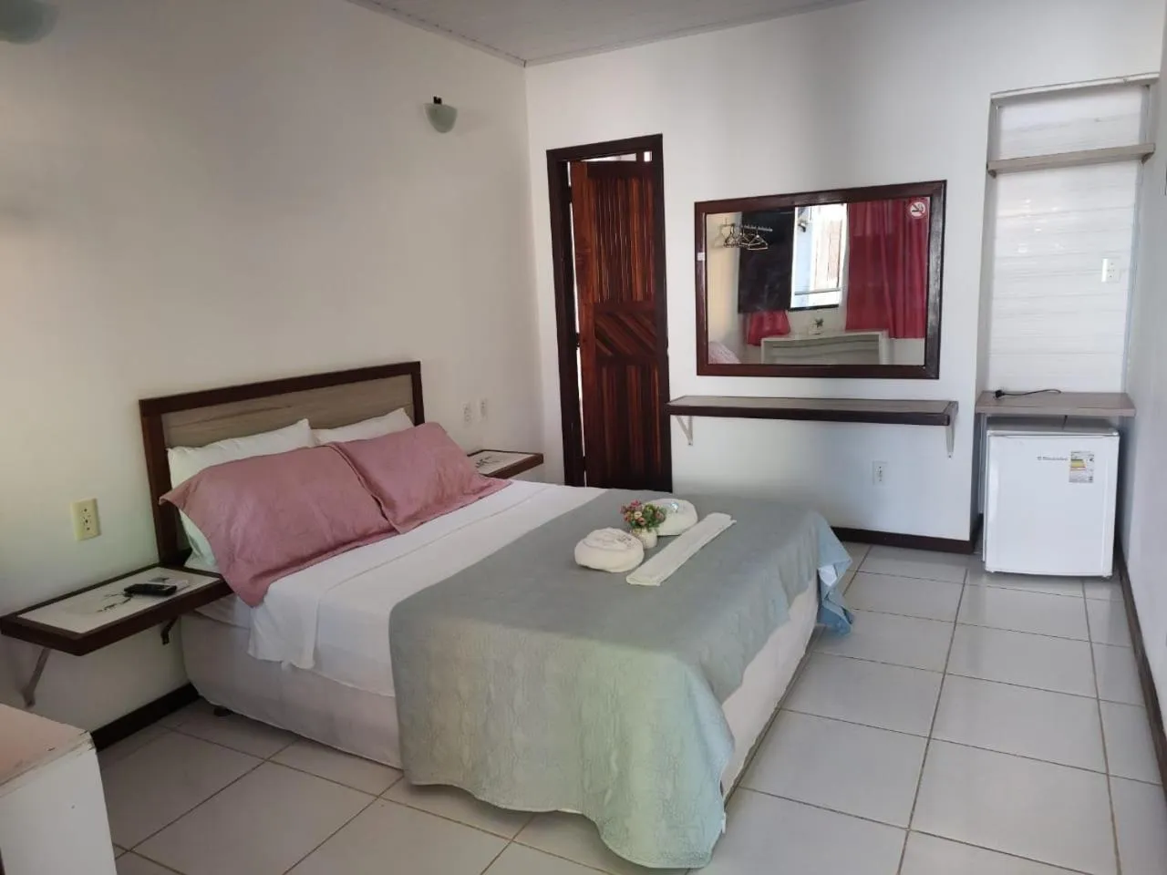 Bed in Pousada Camburi Star