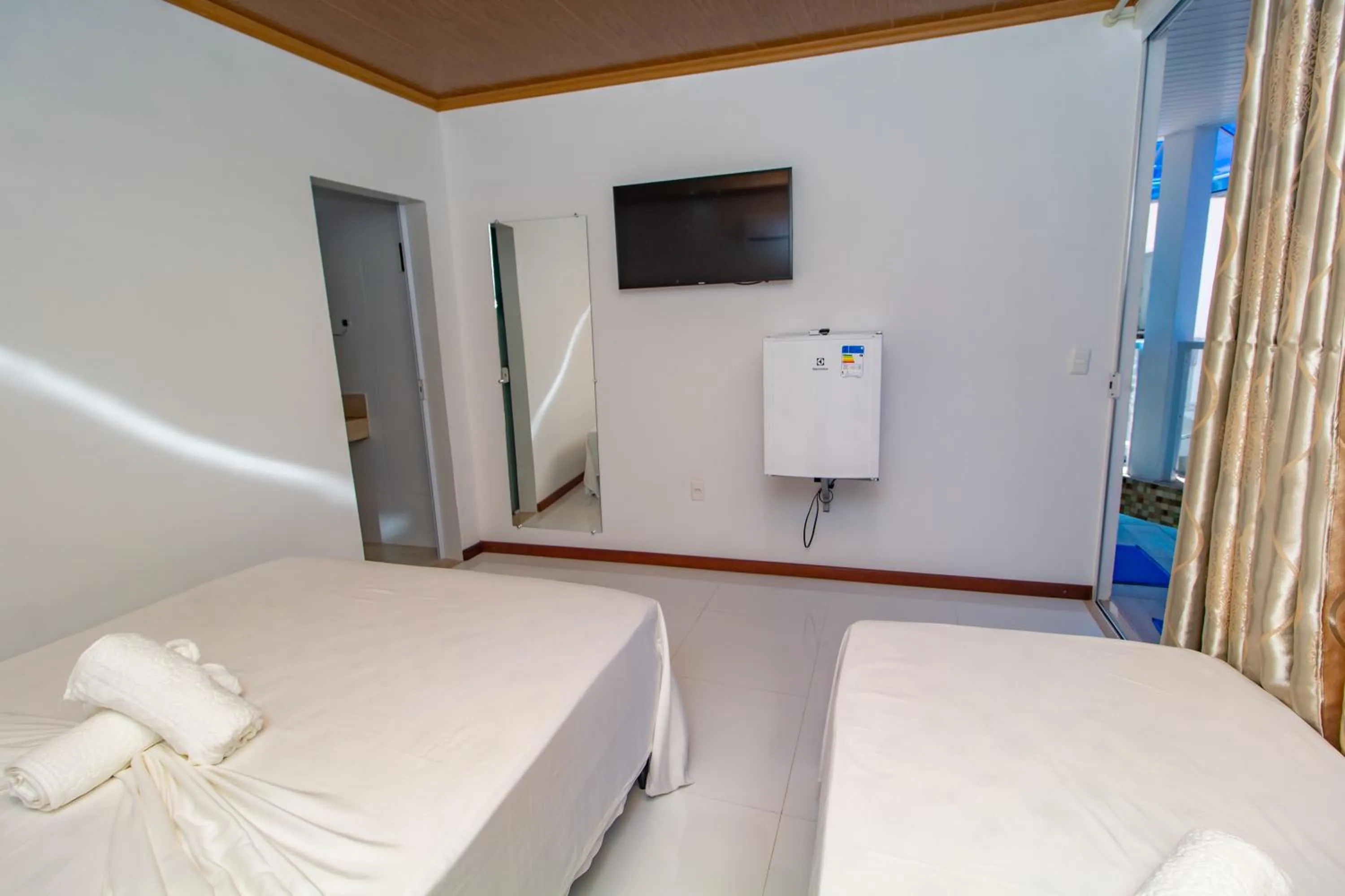 TV and multimedia in Pousada Camburi Star