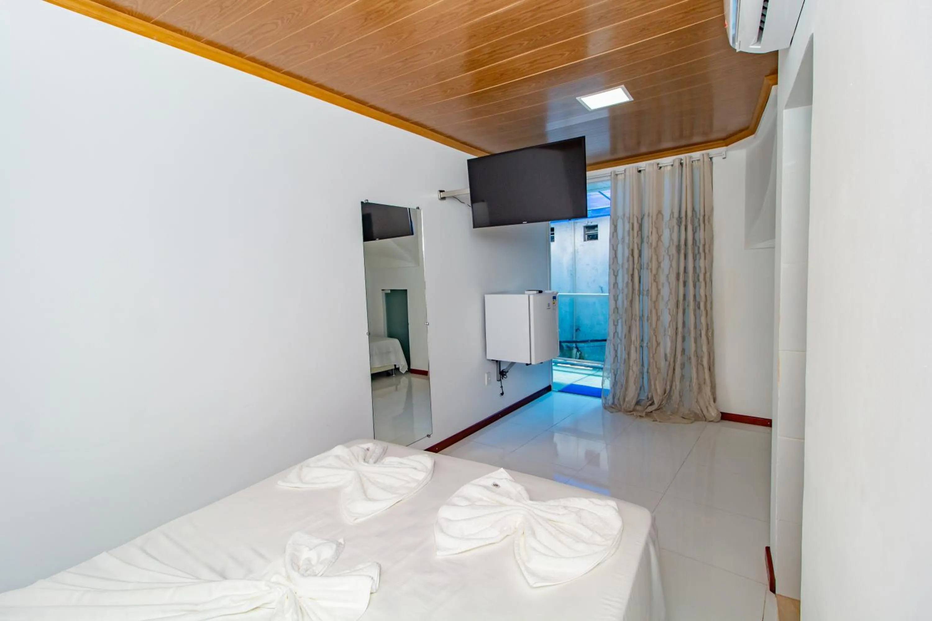 TV and multimedia in Pousada Camburi Star