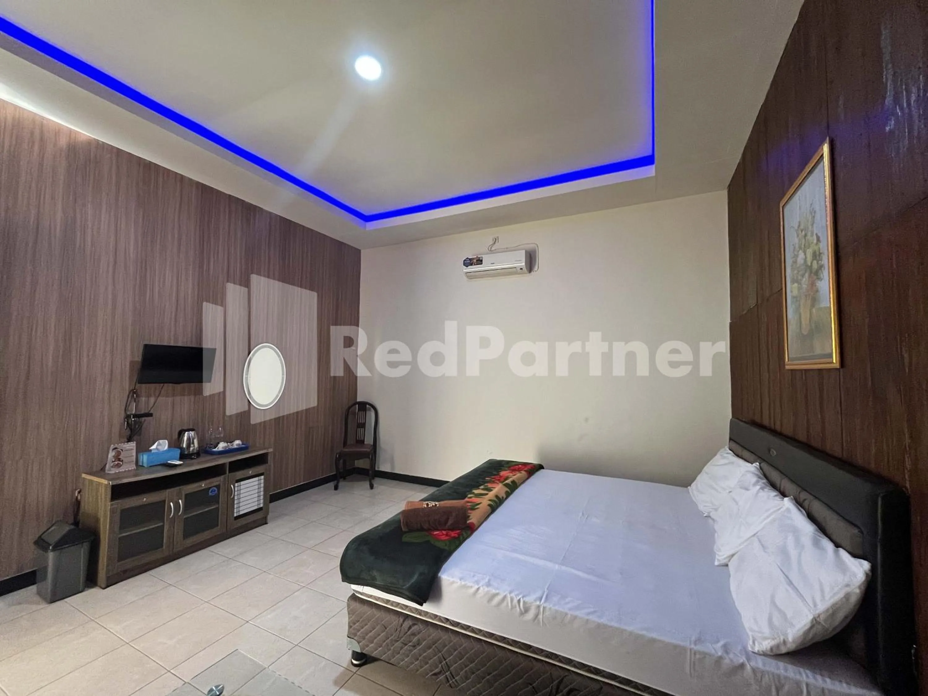 Bedroom, Bed in Hotel Dewi near GOR Merdeka Jombang Mitra RedDoorz