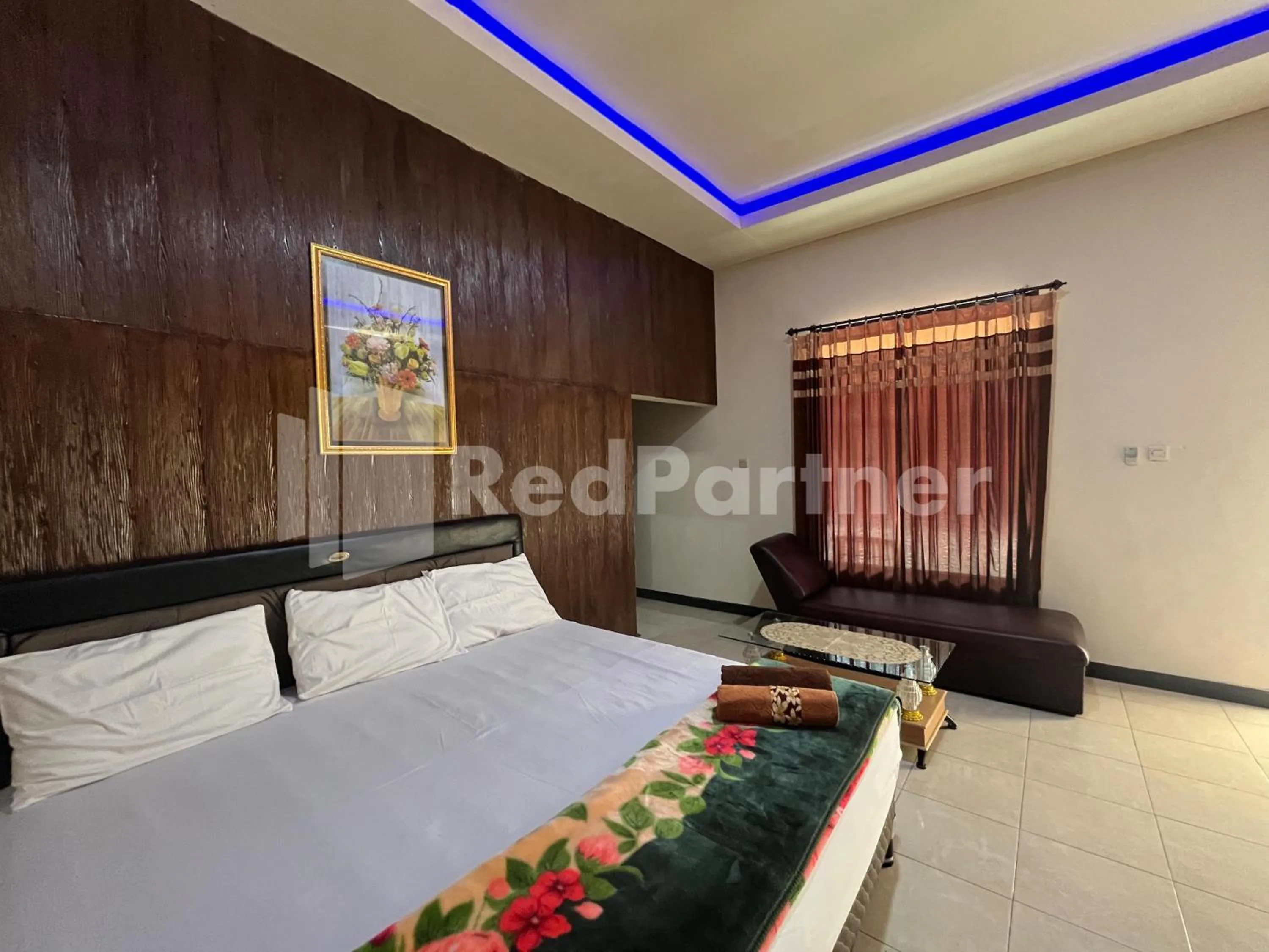 Bedroom, Bed in Hotel Dewi near GOR Merdeka Jombang Mitra RedDoorz