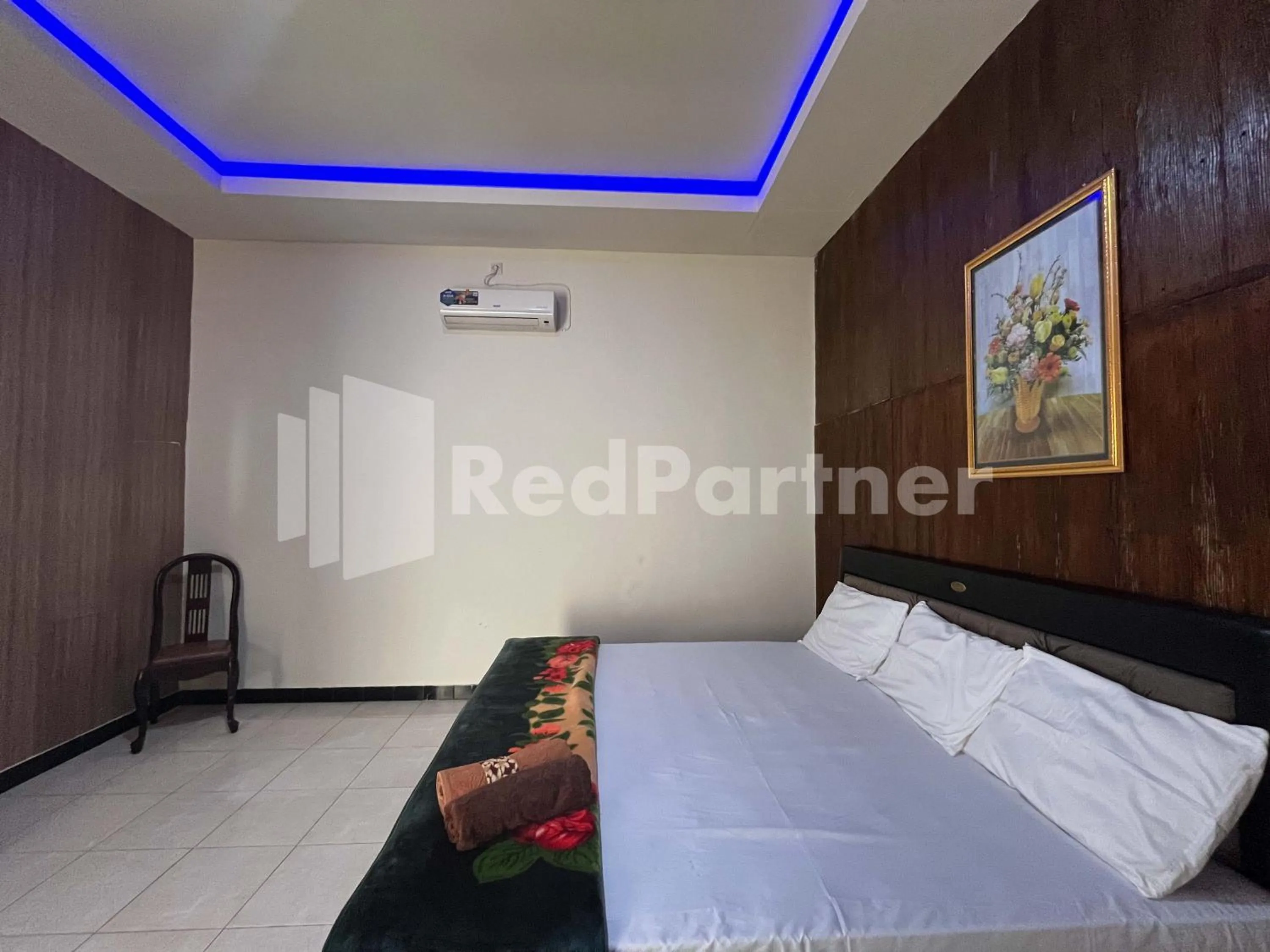 Bedroom, Bed in Hotel Dewi near GOR Merdeka Jombang Mitra RedDoorz