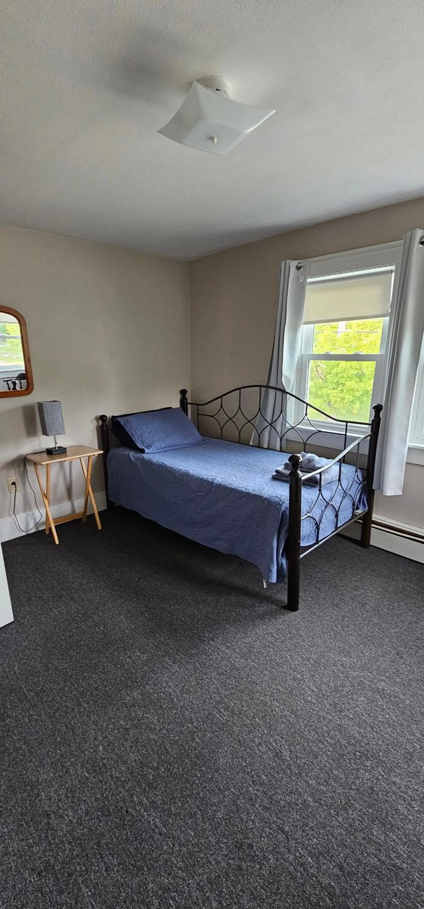 Bed in Lake Shore Farm Inn