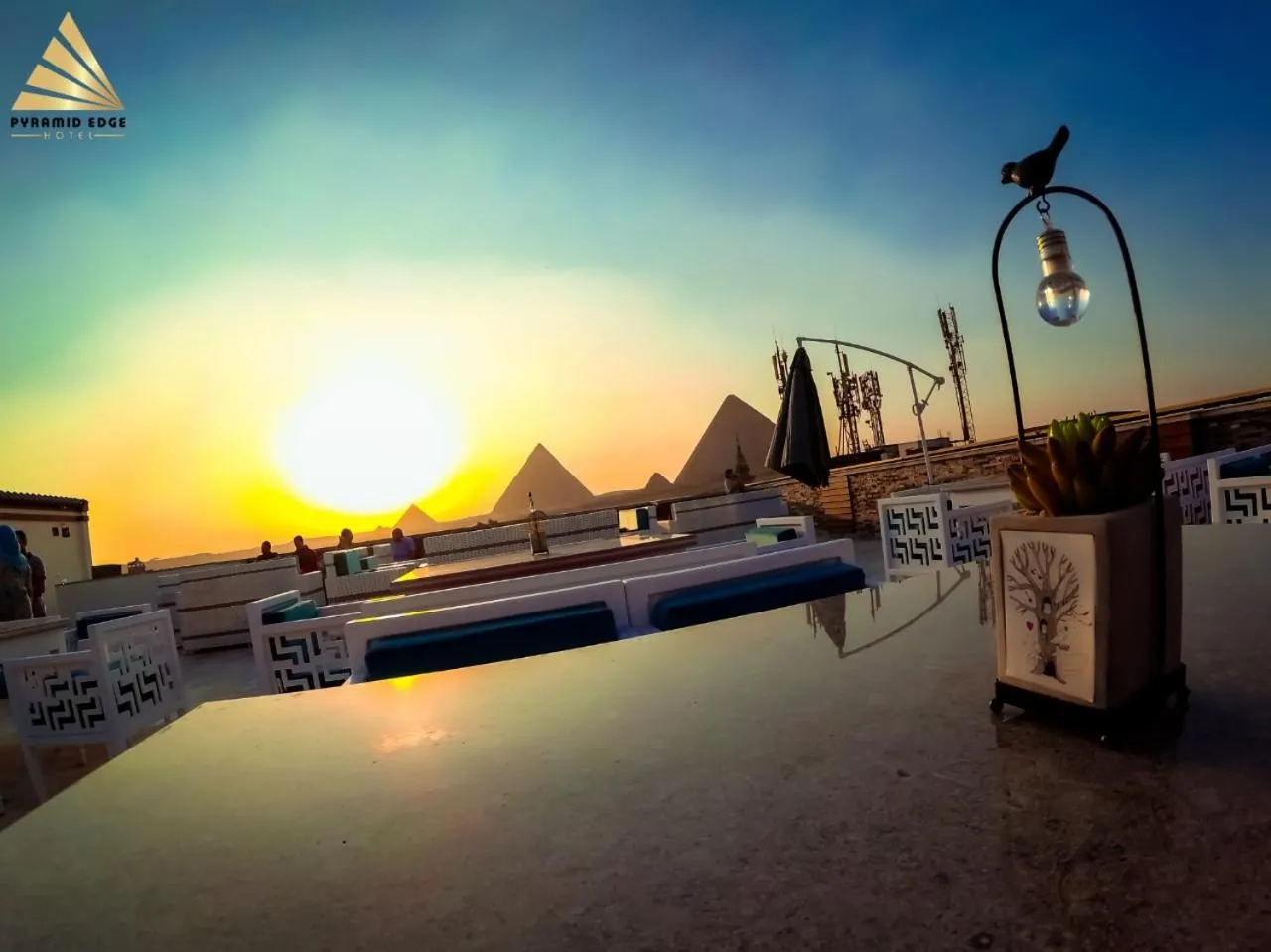 Sunset in Pyramid Edge Hotel & Exclusive Pyramids View Rooftop