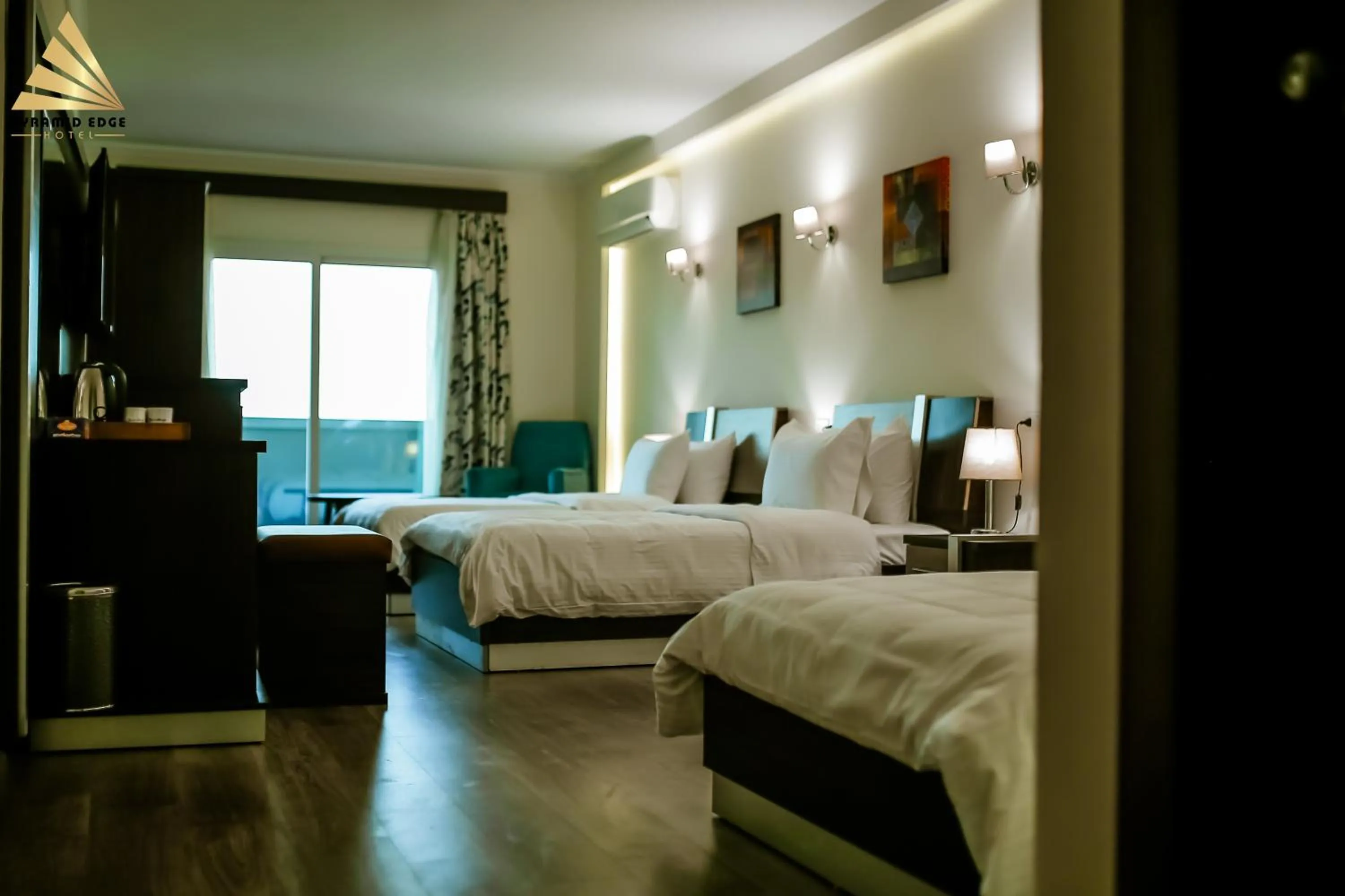 Photo of the whole room, Bed in Pyramid Edge Hotel & Exclusive Pyramids View Rooftop