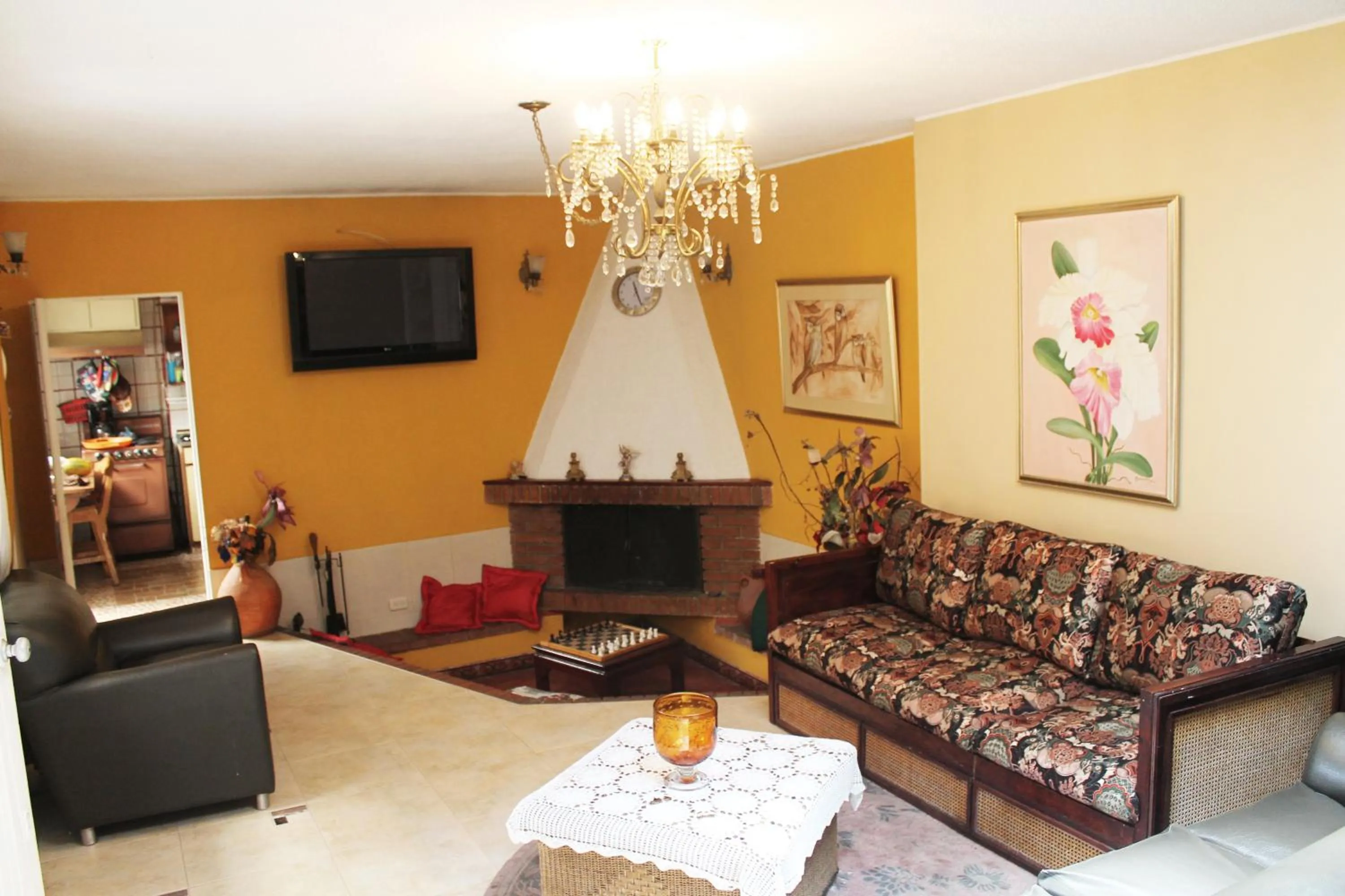 Communal lounge/ TV room in Casa Posada Amelia