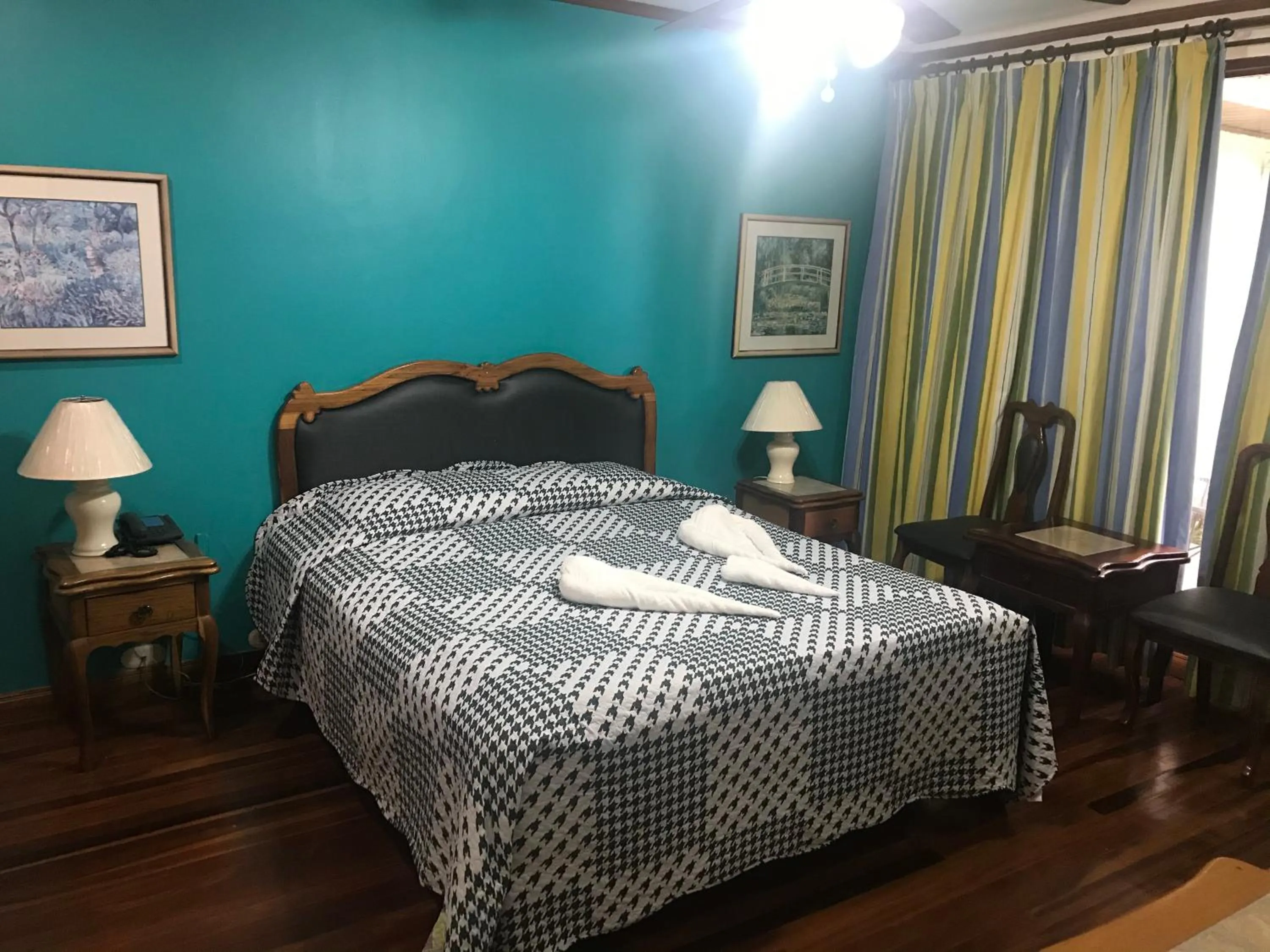 Bed in La Bergerac Boutique Hotel