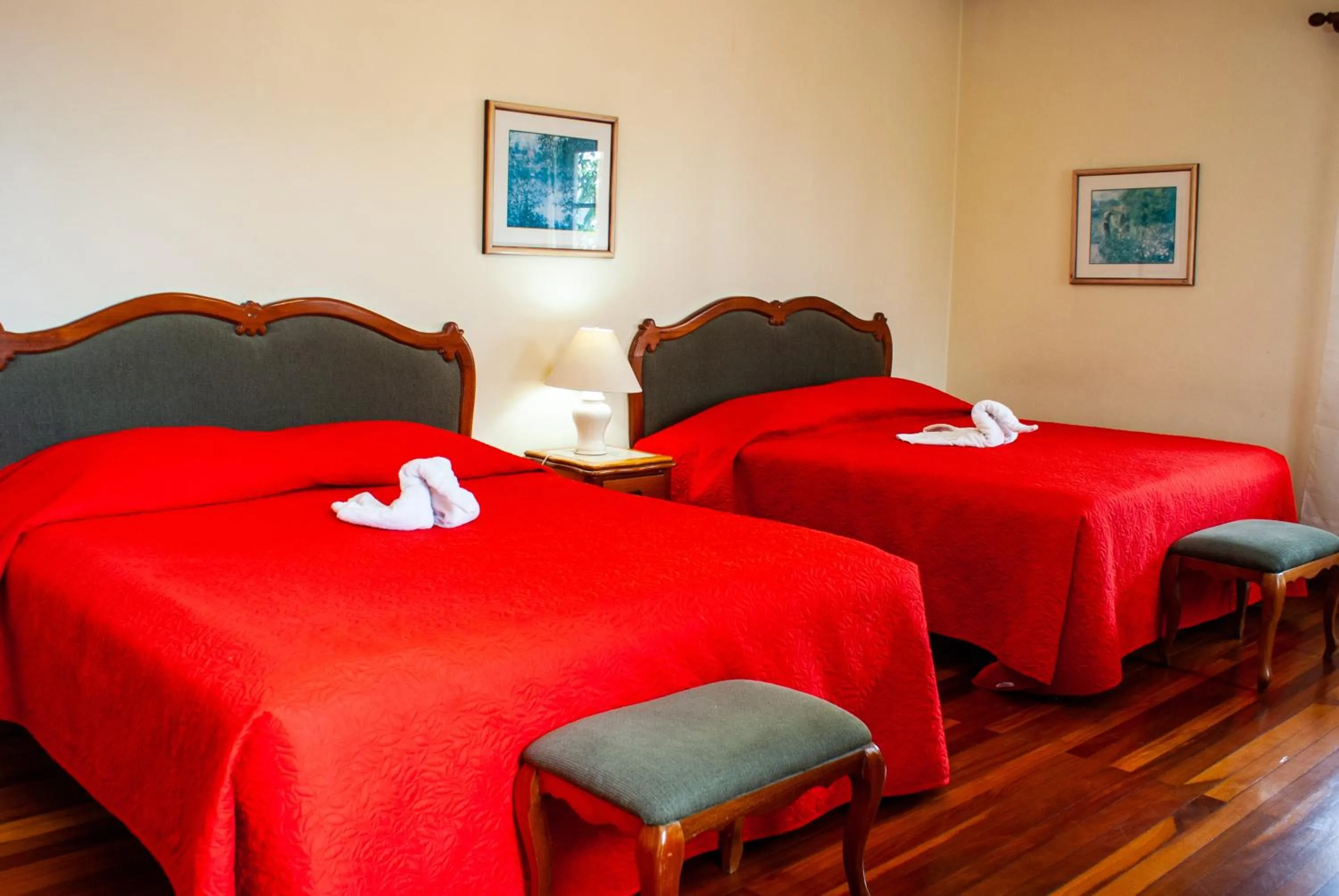 Bed in La Bergerac Boutique Hotel