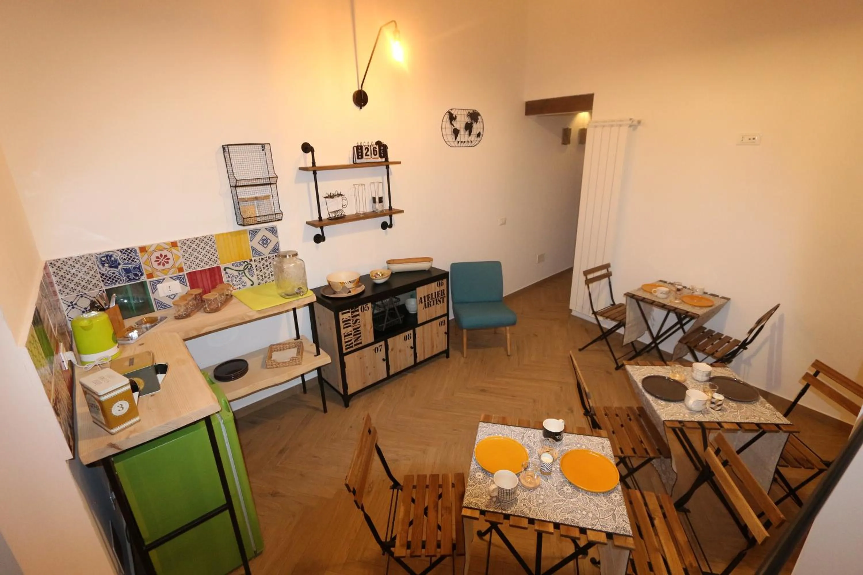 Communal lounge/ TV room in Torre's Camere & caffè