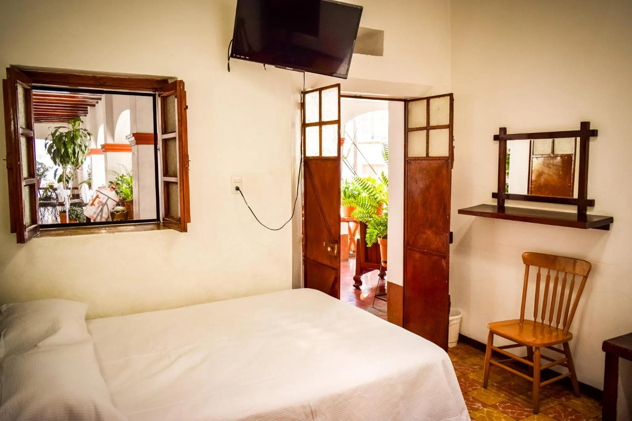 Bed in Hotel Posada Santa Anita