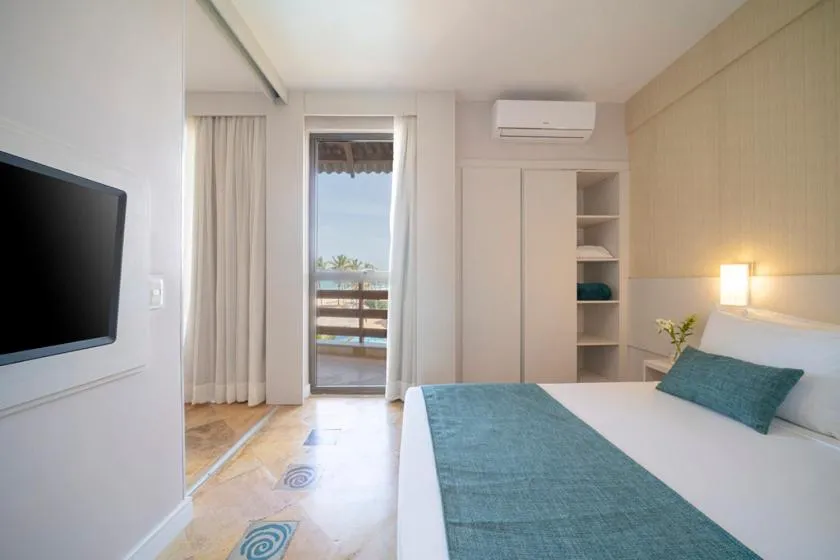 Bedroom, Bed in Beach Park Resort - Suites