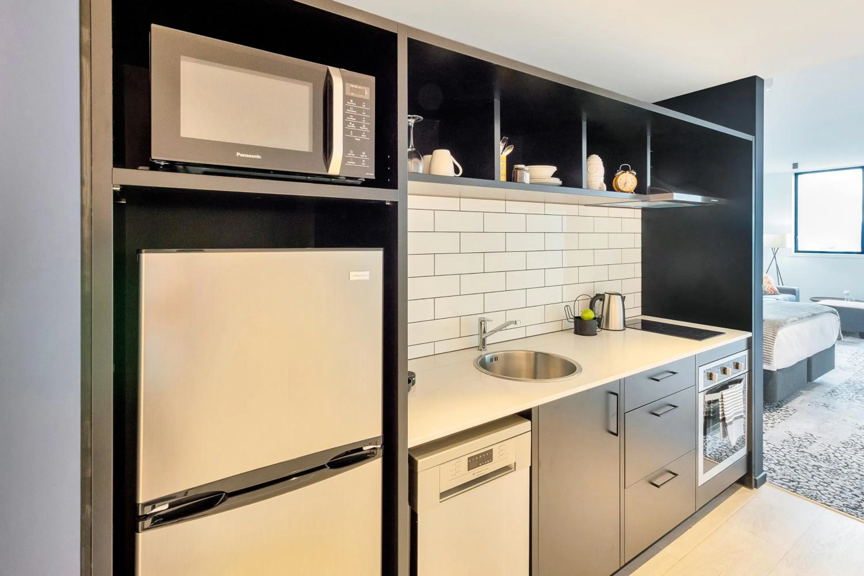 Kitchen or kitchenette in Roomie Apartment Hotel