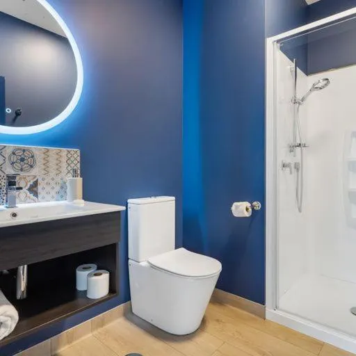 Bathroom in Roomie Apartment Hotel