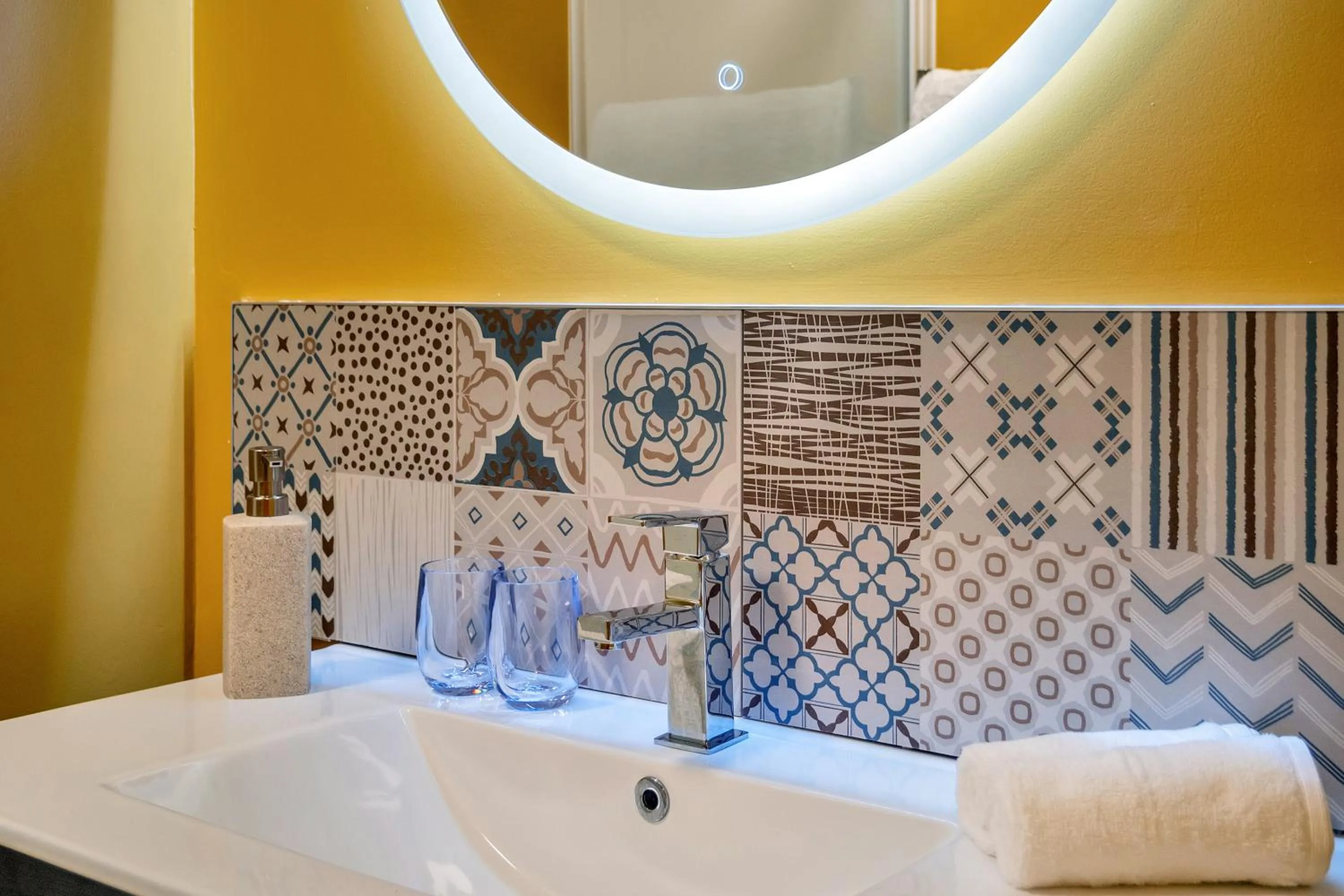 Bathroom in Roomie Apartment Hotel